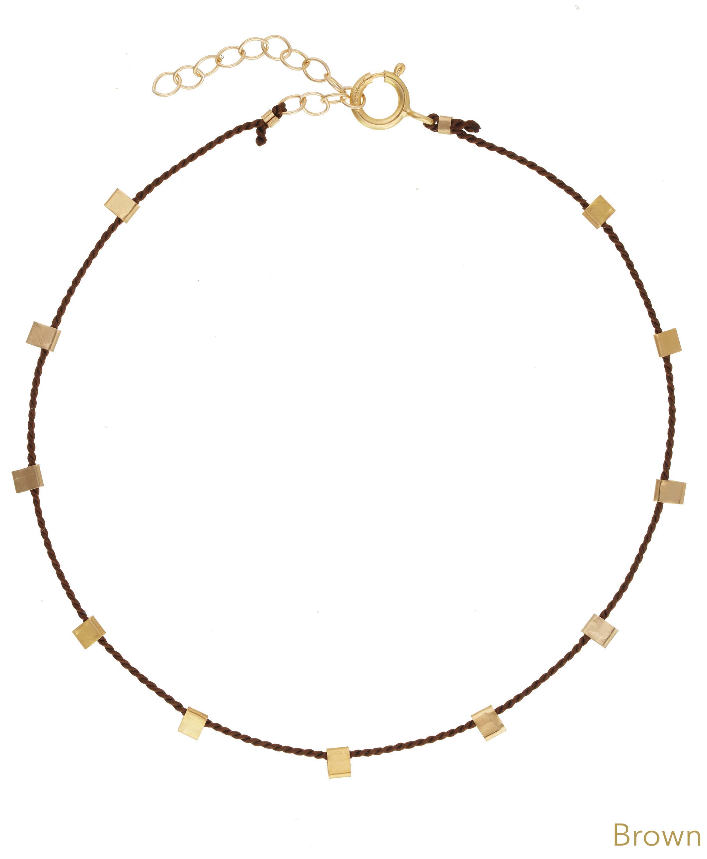 Hilo Bracelet by KOZAKH. A 6 to 7 inch adjustable length natural silk thread bracelet, embellished with 14K Gold Filled metals.