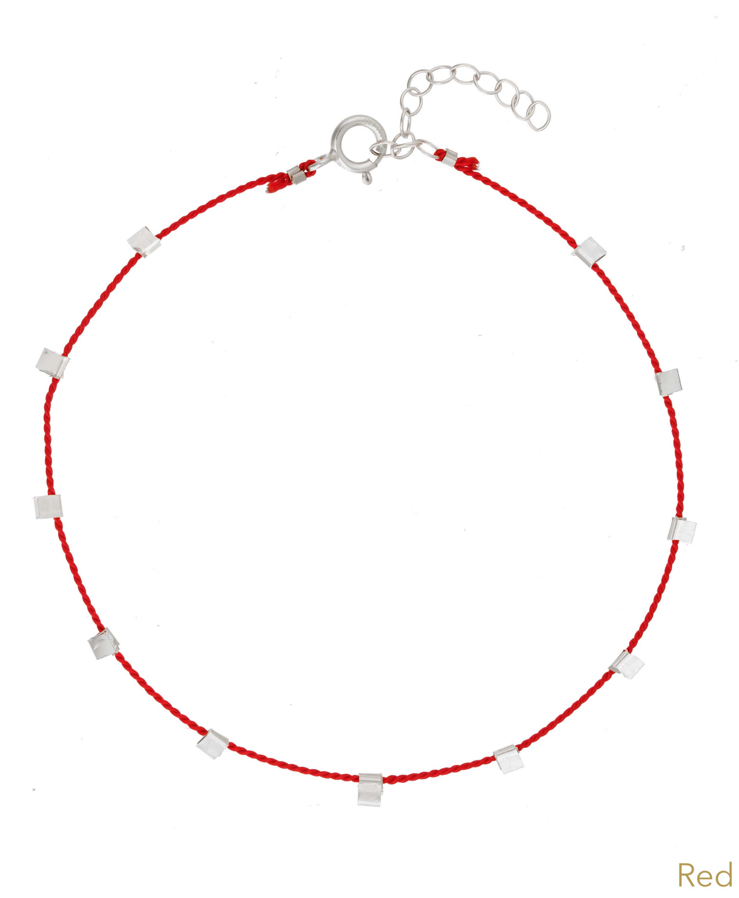 Hilo Bracelet by KOZAKH. A 6 to 7 inch adjustable length natural silk thread bracelet, embellished with Sterling Silver metals.