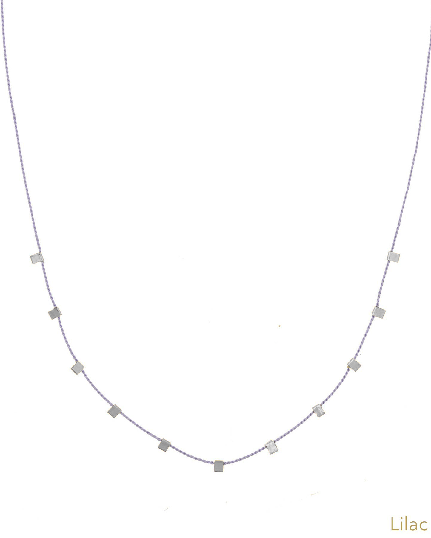 Hilo Necklace by KOZAKH. A 16 inch long natural silk thread necklace, embellished with Sterling Silver square cut metals.