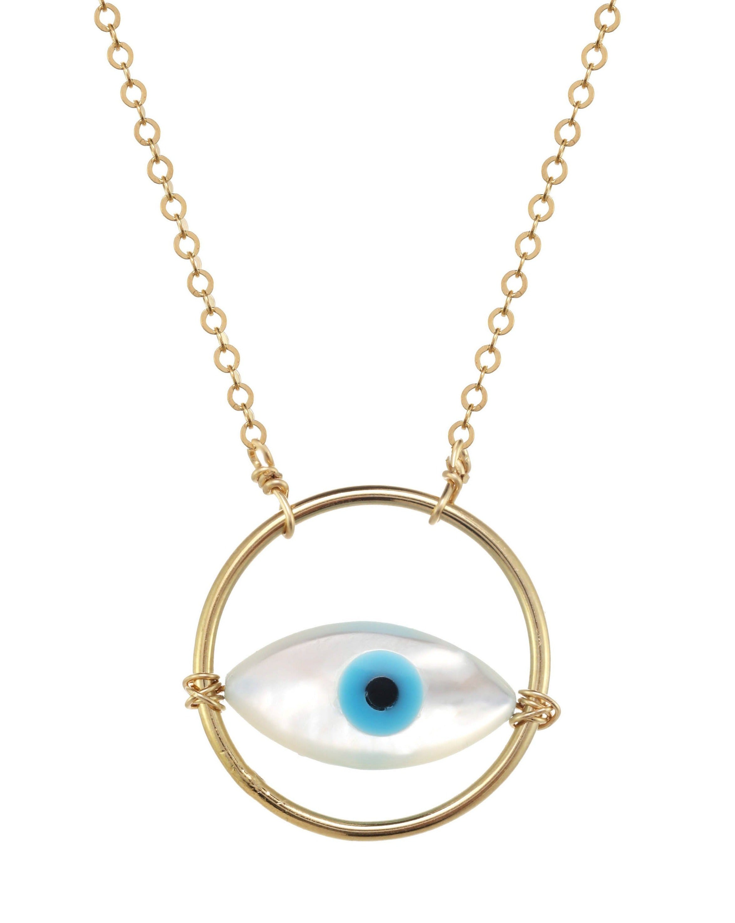 Ino Necklace by KOZAKH. A 16 to 18 inch adjustable length necklace in 14K Gold Filled, featuring a hand carved Mother of Pearl Evil Eye charm inside a ring.