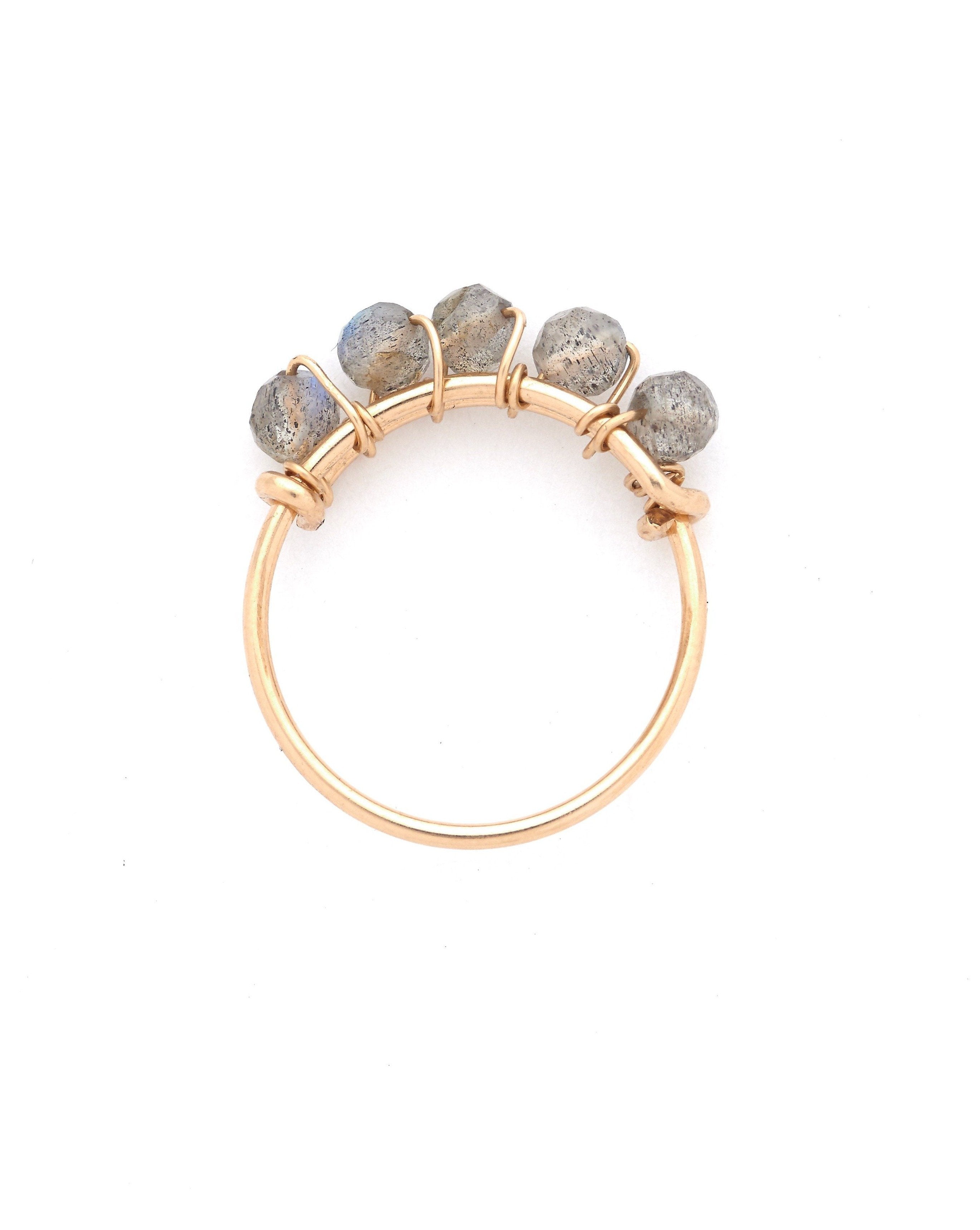 Gem Braided Ring by KOZAKH. A 1mm thick ring, crafted in 14K Gold Filled, featuring braided Labradorite gems.
