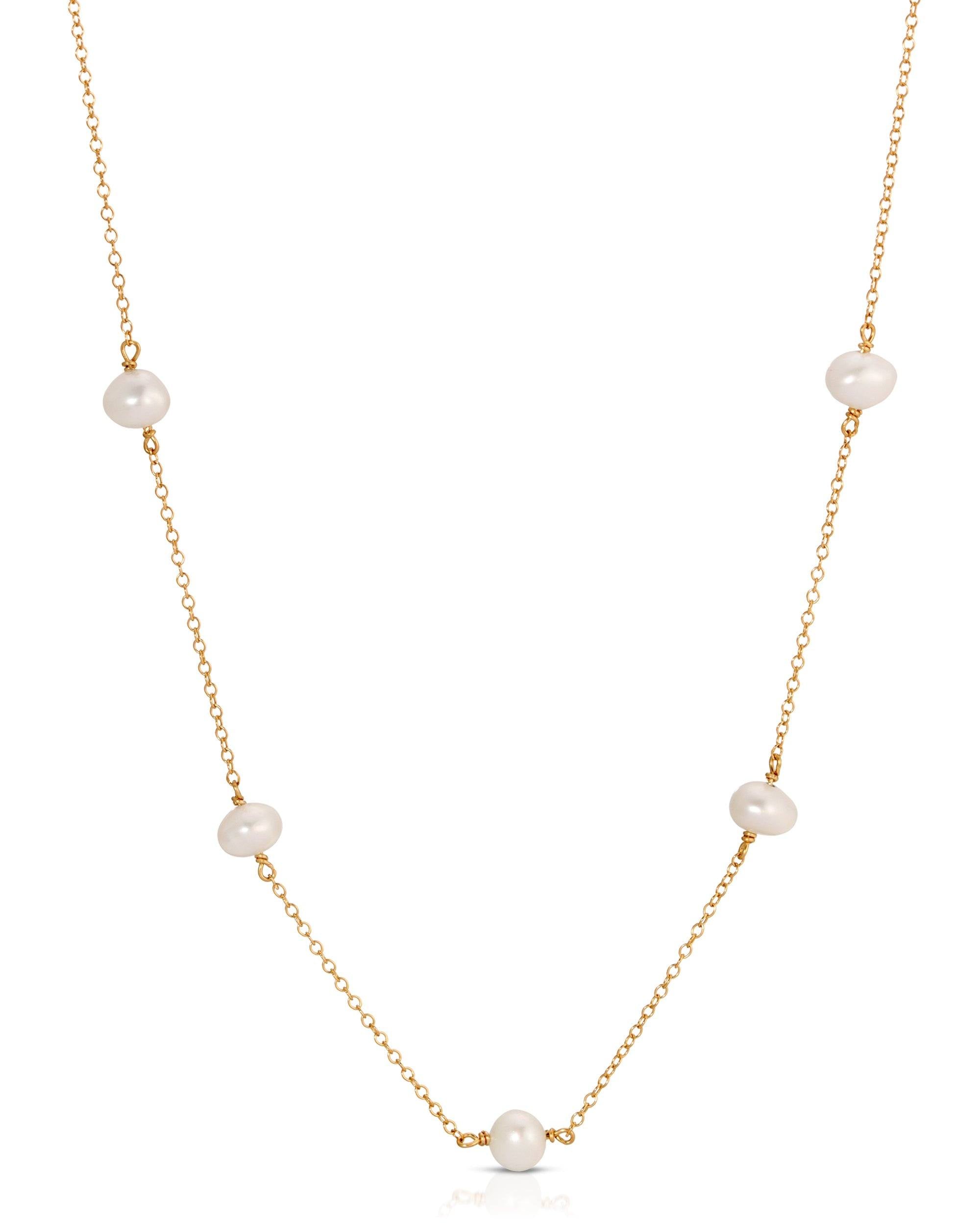 Lajos Necklace by KOZAKH. A 16 to 18 inch adjustable length necklace, crafted in 14K Gold Filled, featuring irregular white freshwater Pearls.