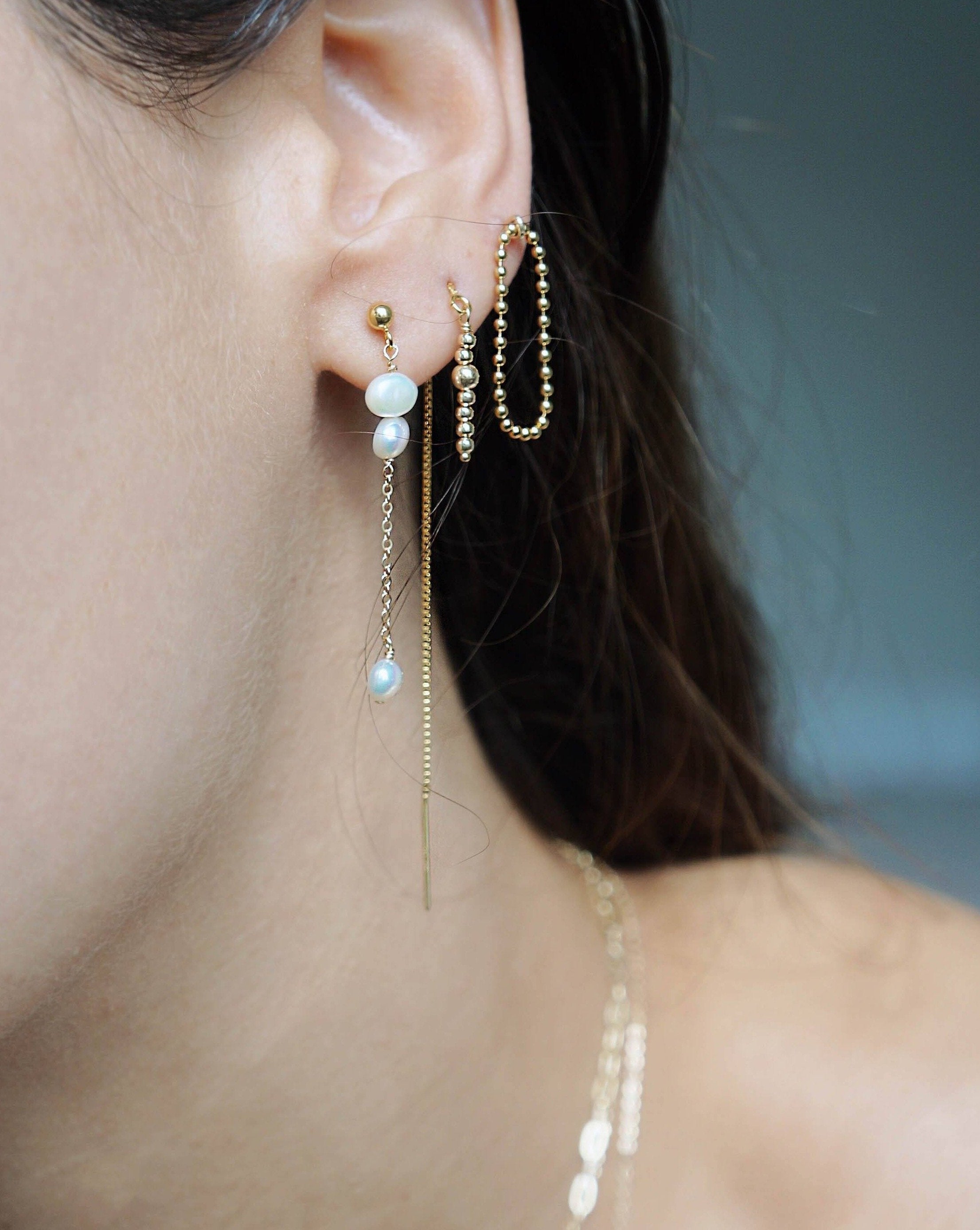 Laleh Earrings by KOZAKH. 3mm ball stud drop earrings in 14K Gold Filled, featuring 4x5mm irregular freshwater Pearls.