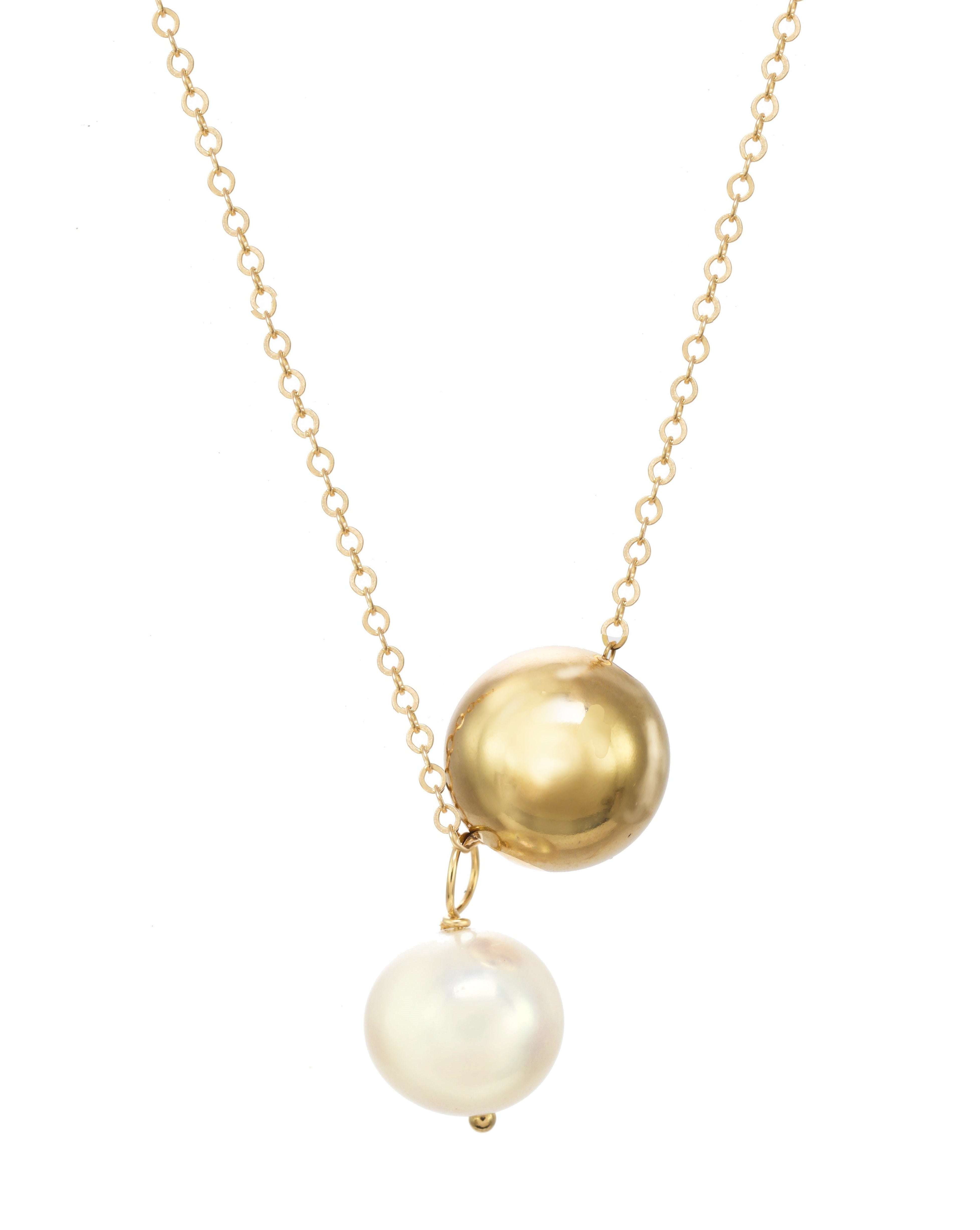 Lark Necklace by KOZAKH. A 16 to 18 inch adjustable length necklace, crafted in 14K Gold Filled, featuring an 8mm white freshwater pearl and a seamless gold bead.