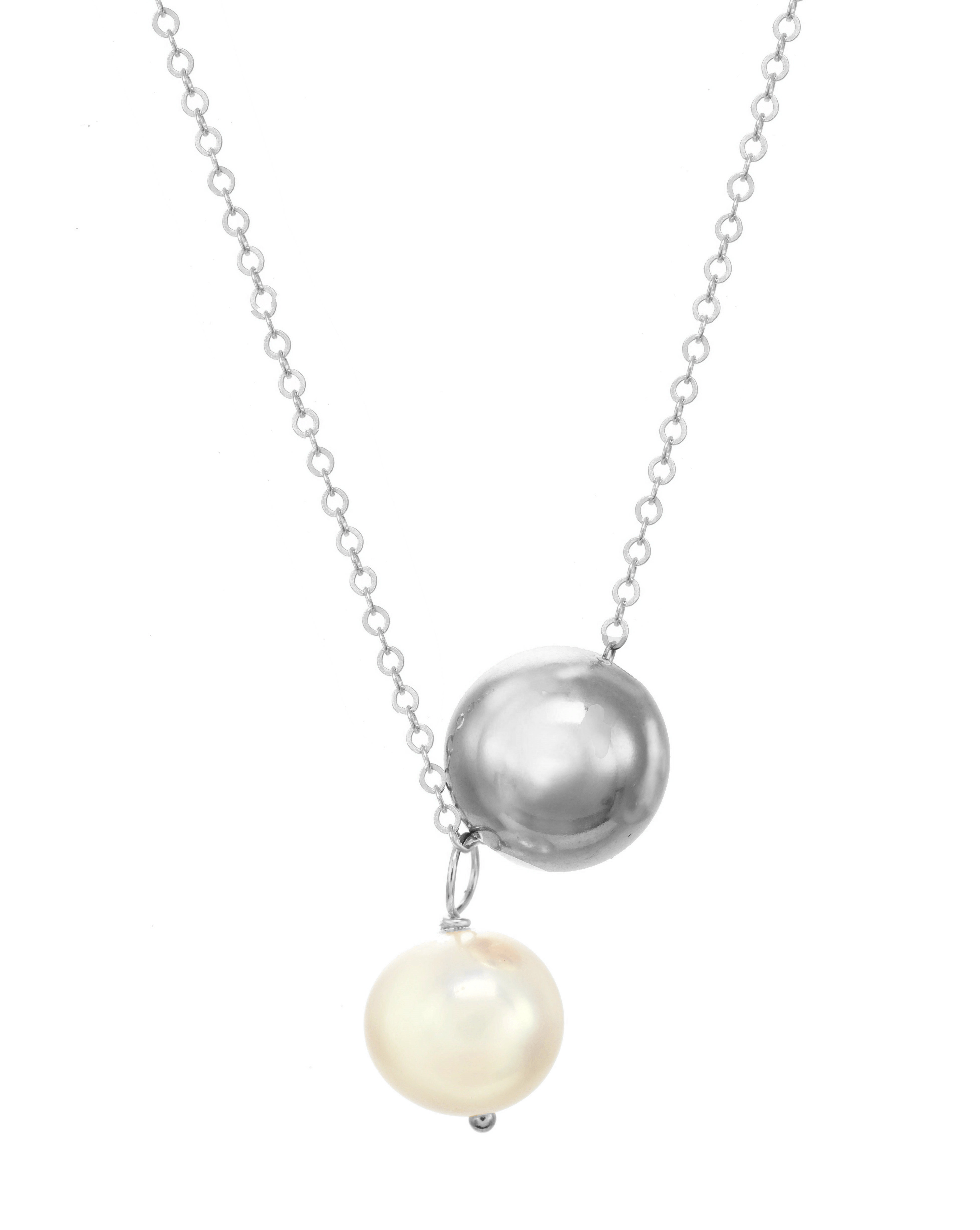 Lark Necklace by KOZAKH. A 16 to 18 inch adjustable length necklace, crafted in Sterling Silver, featuring an 8mm white freshwater pearl and a seamless silver bead.
