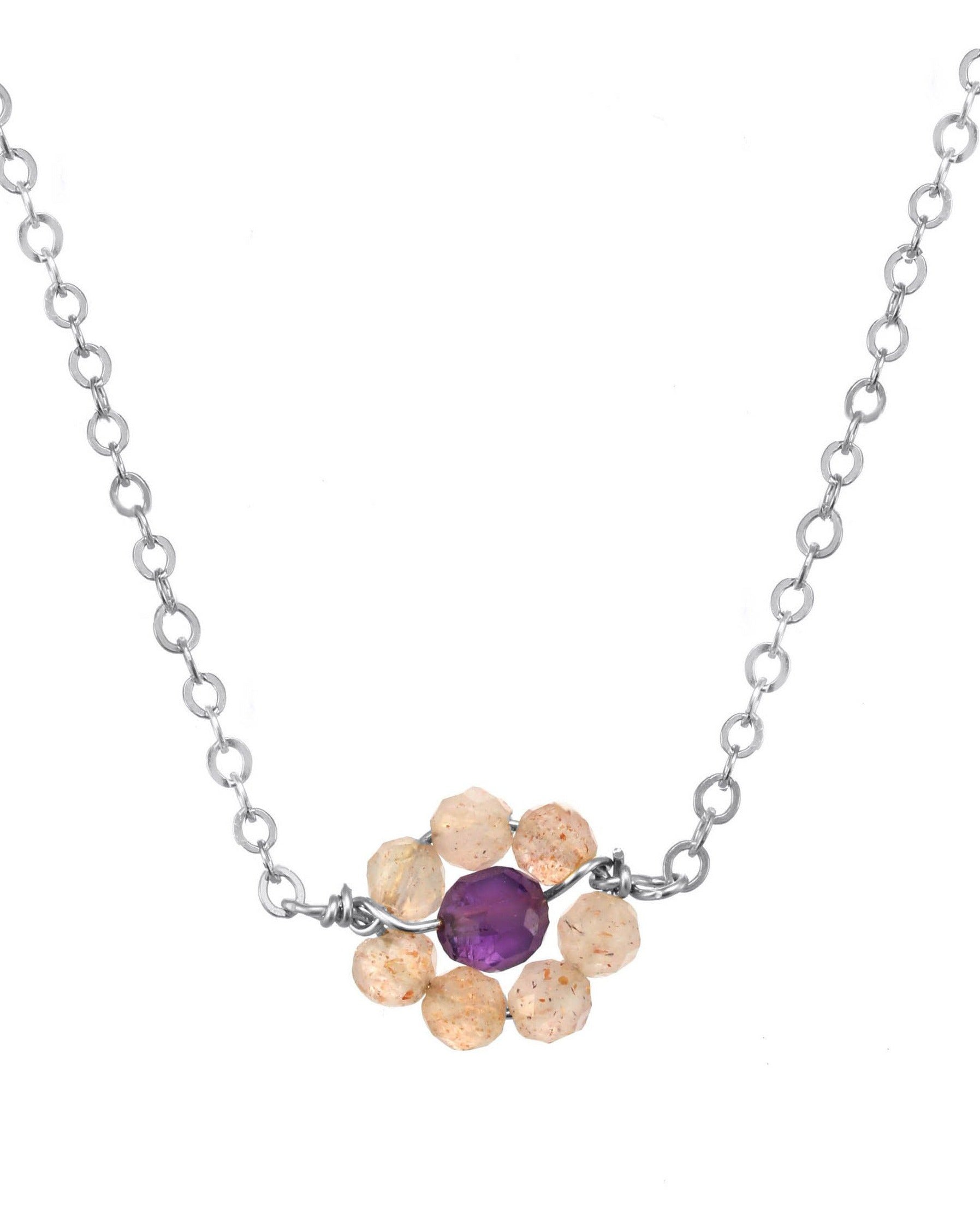 Little Hill Necklace by KOZAKH. A 16 to 18 inch adjustable length necklace, crafted in Sterling Silver, featuring 2mm faceted Imperial Topaz gems and a 3mm  faceted Garnet forming a flower charm.
