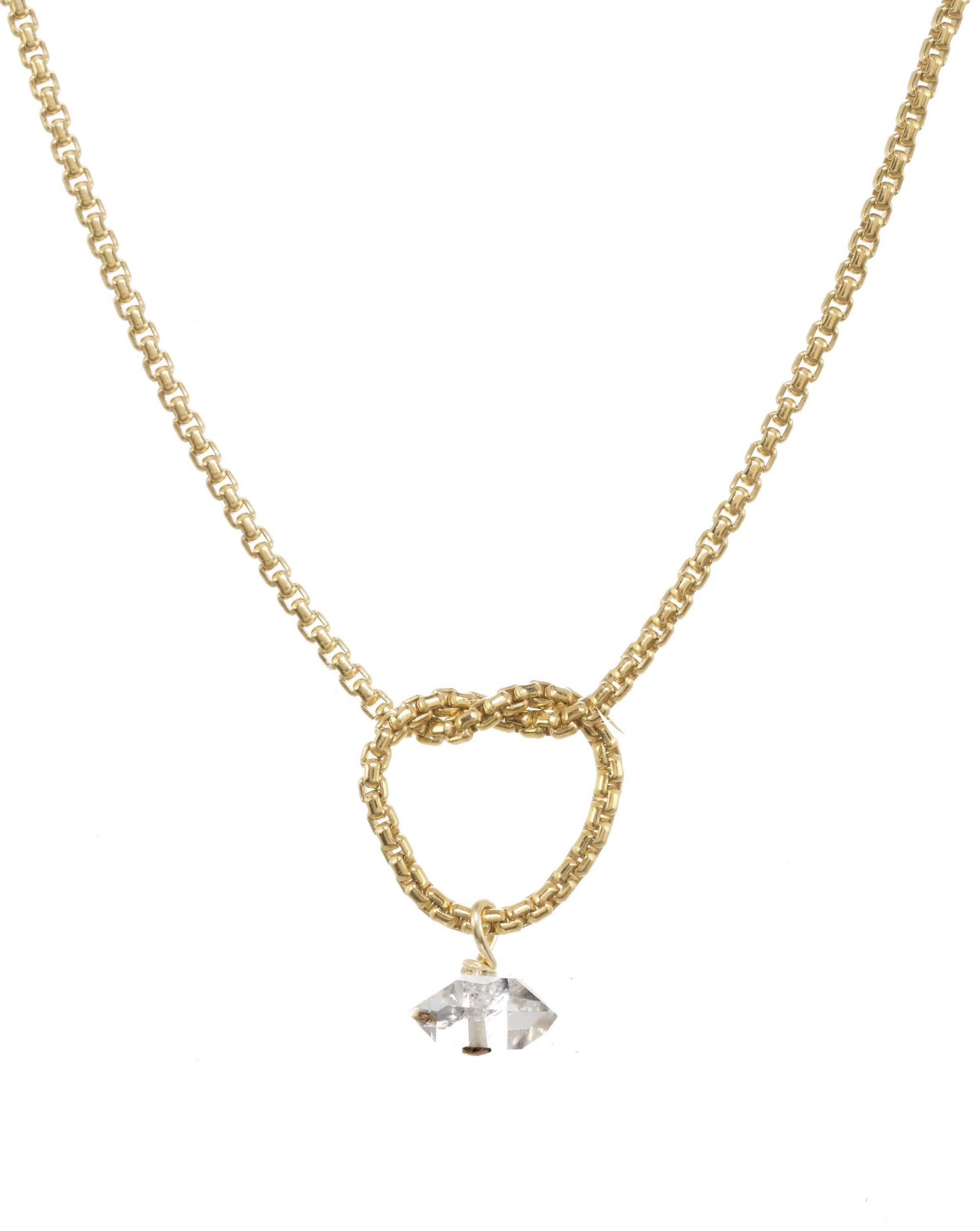 Love Knot Necklace by KOZAKH. A 16 to 18 inch adjustable length necklace, crafted in 14K Gold Filled, featuring a knot and a faceted Herkimer Diamond.