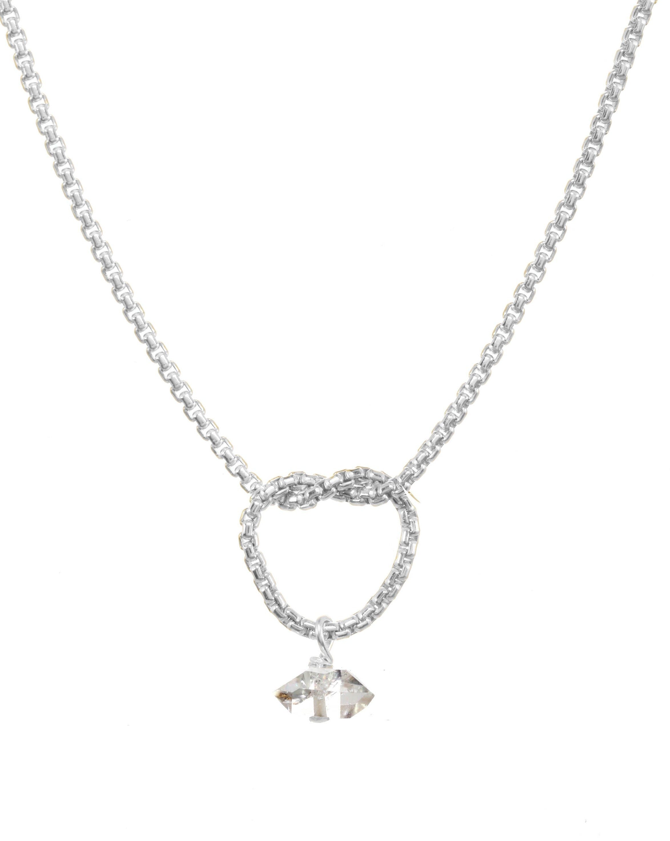 Love Knot Necklace by KOZAKH. A 16 to 18 inch adjustable length necklace, crafted in Sterling Silver, featuring a knot and a faceted Herkimer Diamond.
