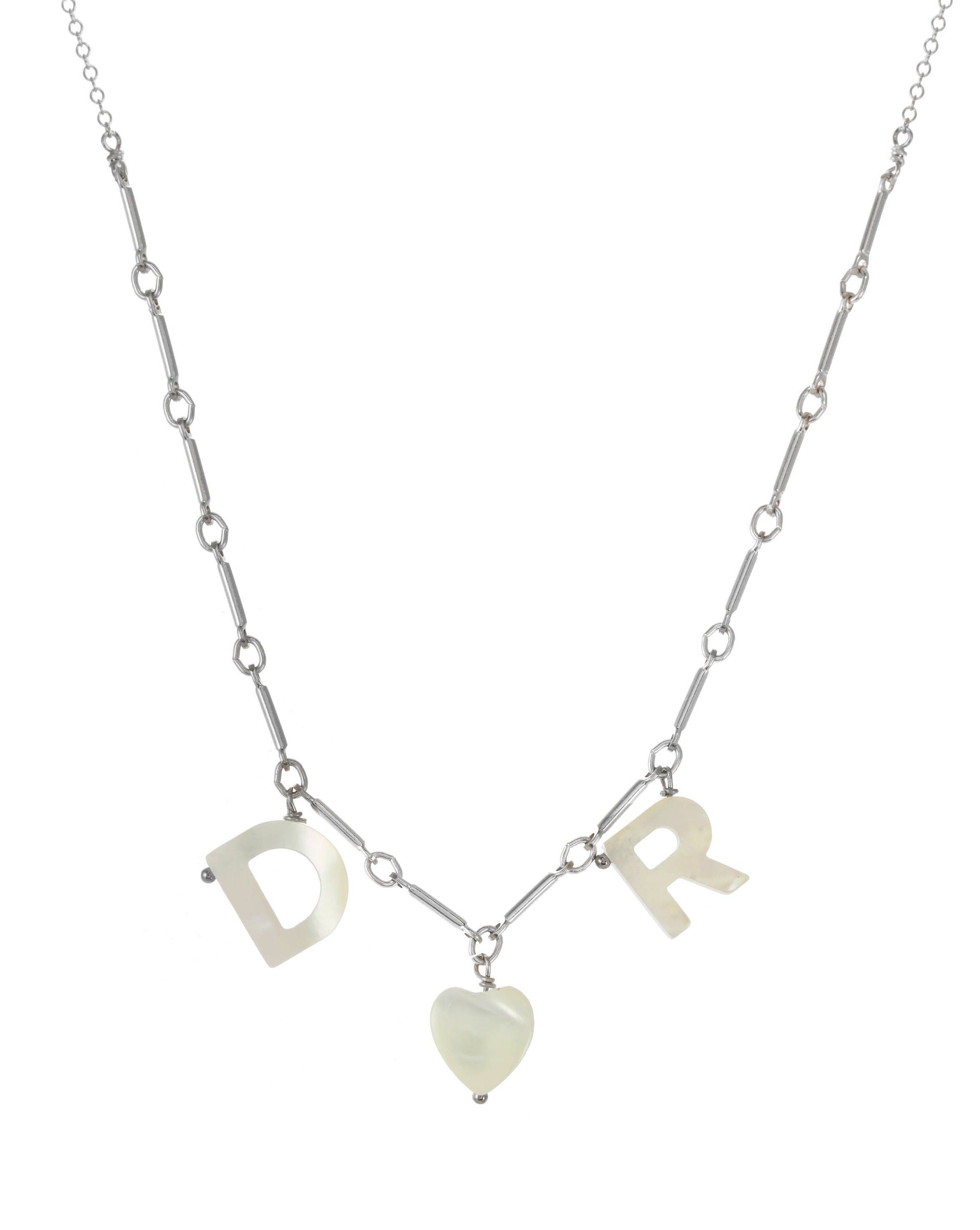Love Necklace by KOZAKH. A 16 to 18 inch adjustable length necklace with linked bar chain on bottom half and flat link chain on top half, crafted in Sterling Silver, featuring a customizable word made from hand carved Mother of Pearl letters.