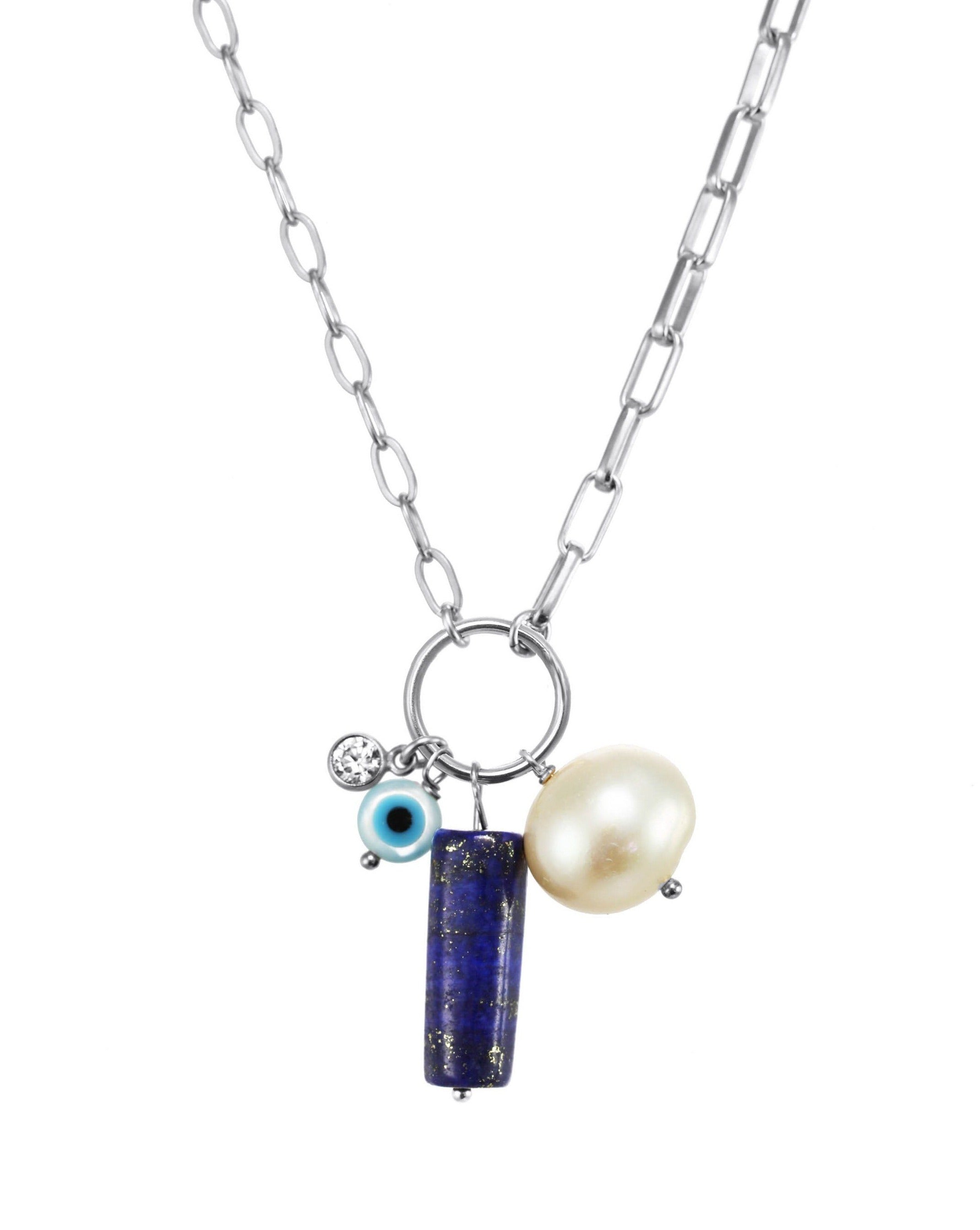 Lucky Necklace by KOZAKH. A 16 to 18 inch adjustable length necklace with flat link chain on one half and mini paperclip chain on the other half, crafted in Sterling Silver, featuring a cylindrical Lapis, a round Freshwater Pearl, and a hand carved Mother of Pearl Evil Eye.