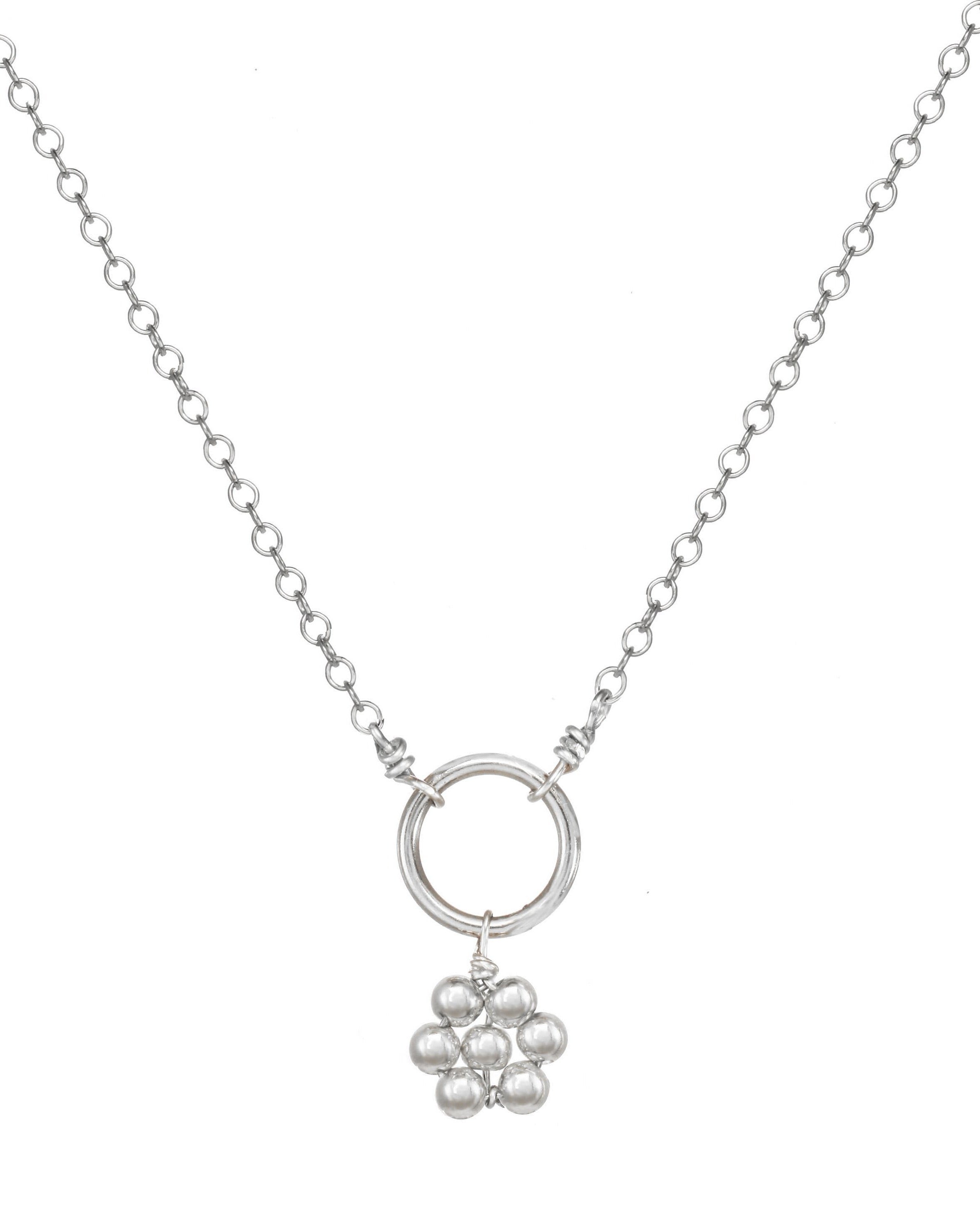 Luella Necklace by KOZAKH. A 16 to 18 inch adjustable length necklace, crafted in Sterling Silver, featuring a handmade beaded daisy charm.