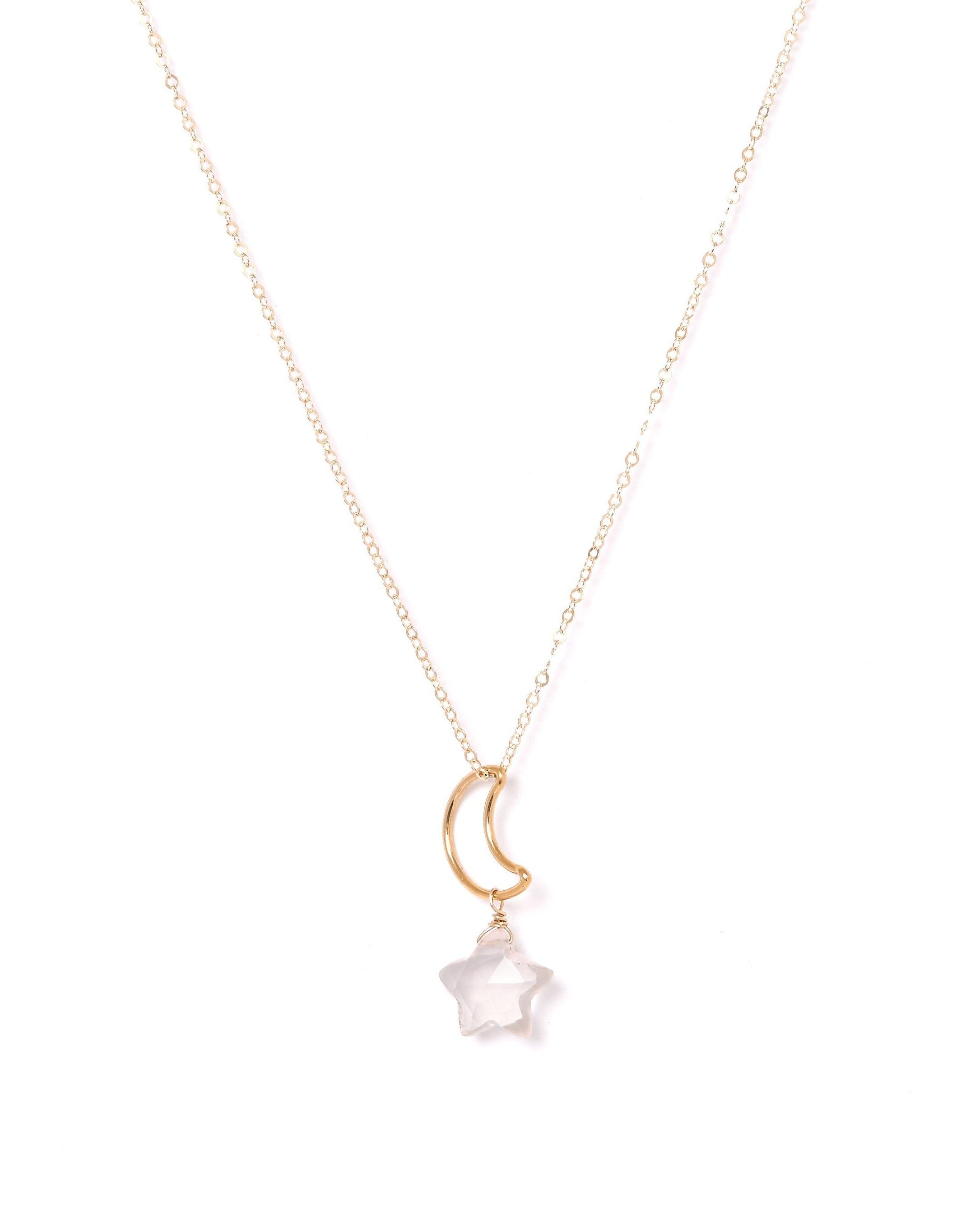 Lunastar Necklace by KOZAKH. A 16 to 18 inch adjustable length necklace, crafted in 14K Gold Filled, featuring a 13mm moon charm and a Rose Quartz star charm.