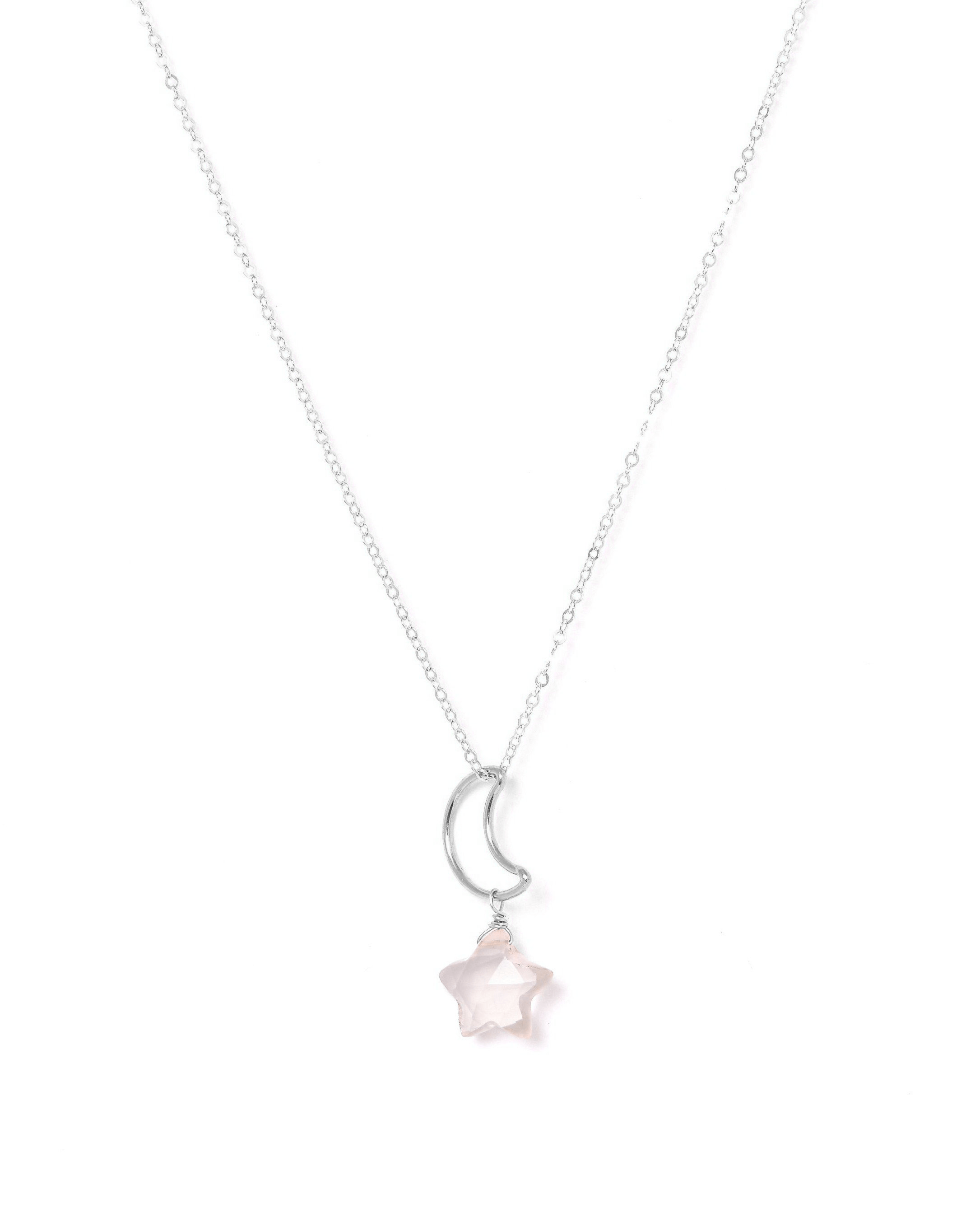 Lunastar Necklace by KOZAKH. A 16 to 18 inch adjustable length necklace, crafted in Sterling Silver, featuring a 13mm moon charm and a Rose Quartz star charm.