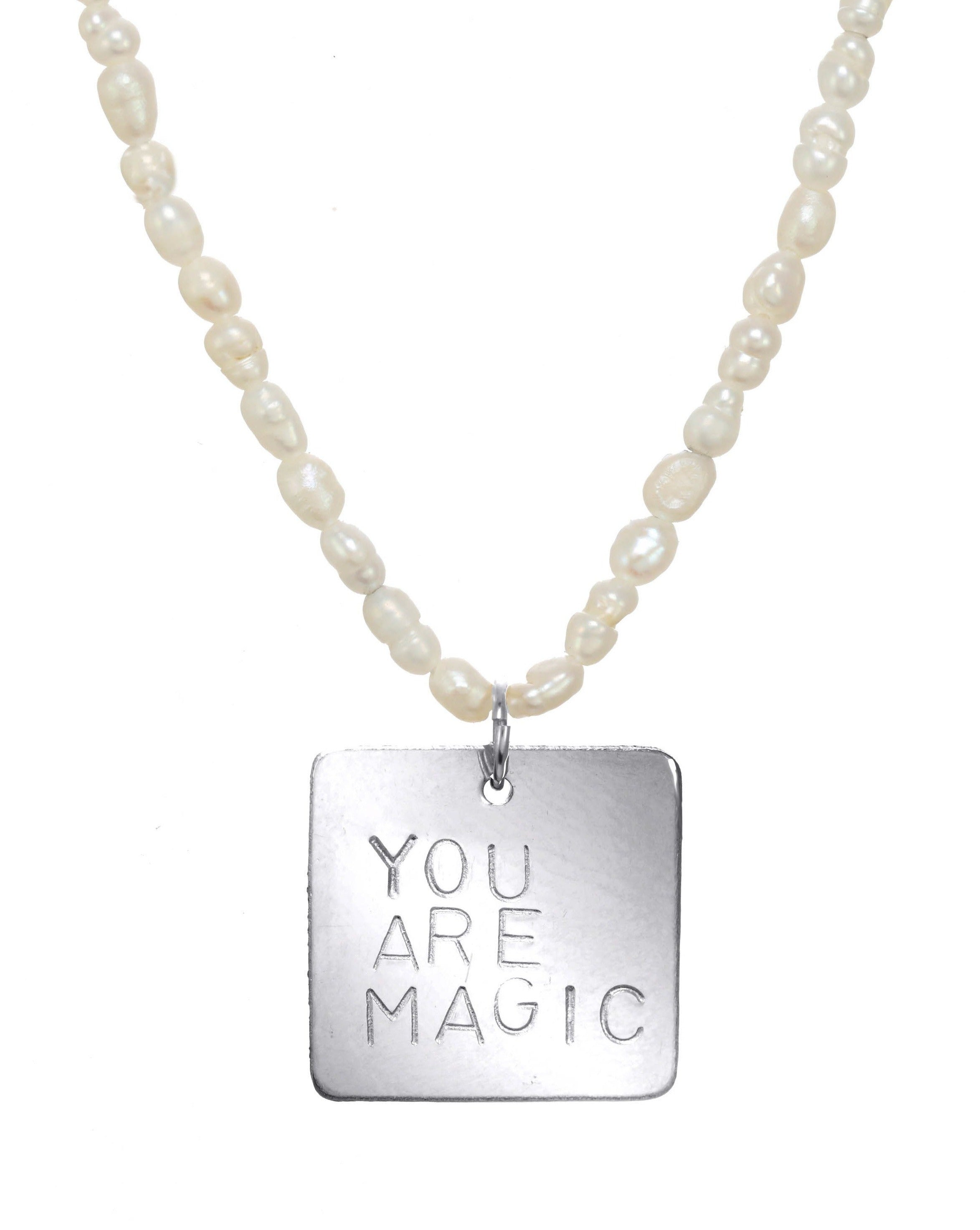 Magic Necklace by KOZAKH. A 16 to 18 inch adjustable length necklace with Freshwater rice Pearls strand, crafted in Sterling Silver, featuring a square pendant with an engraved quote.