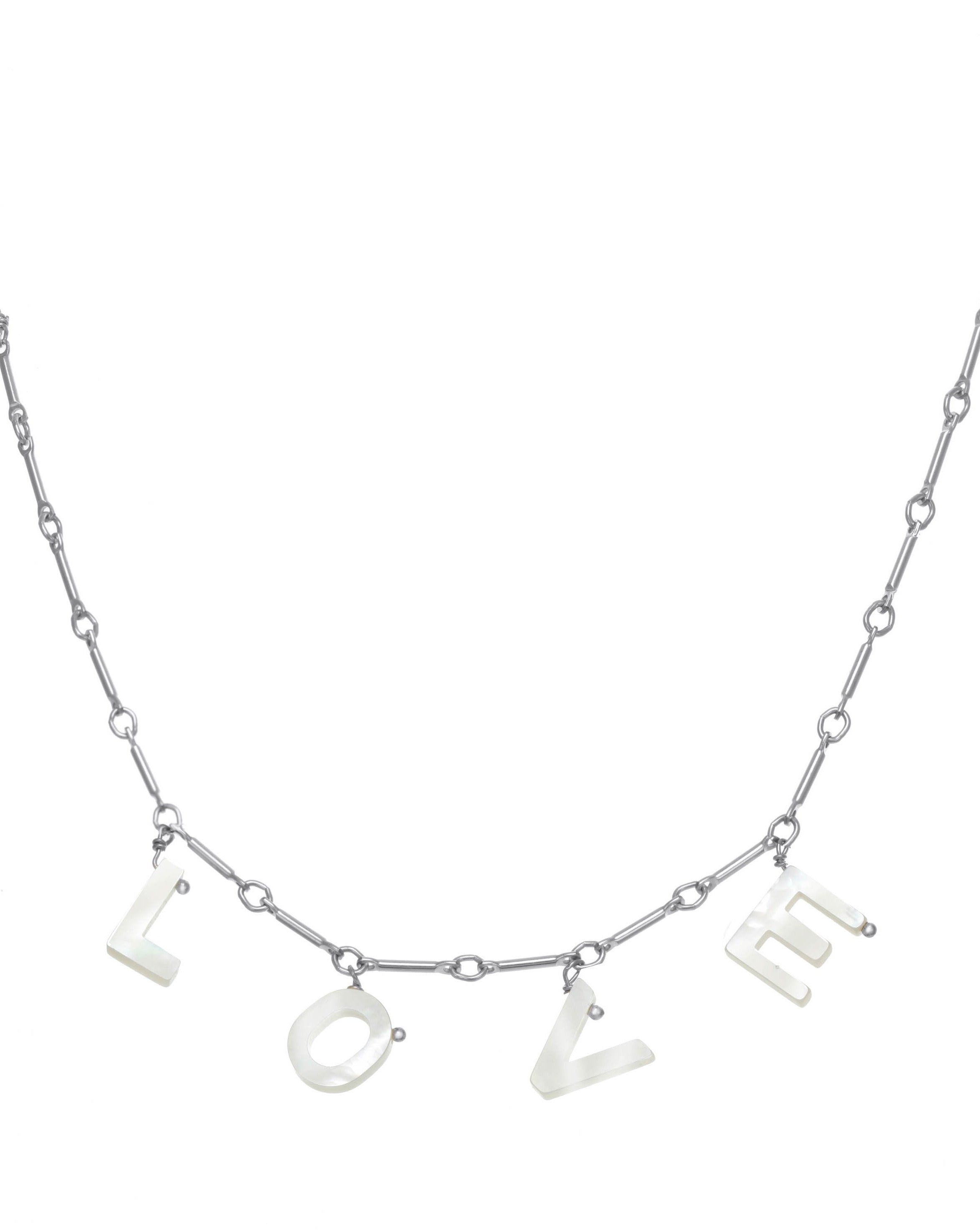 Mama Necklace by KOZAKH. A 16 to 18 inch adjustable length necklace with linked bar chain on bottom half and flat link chain on top half, crafted in Sterling Silver, featuring a customizable word made from hand carved Mother of Pearl letters.
