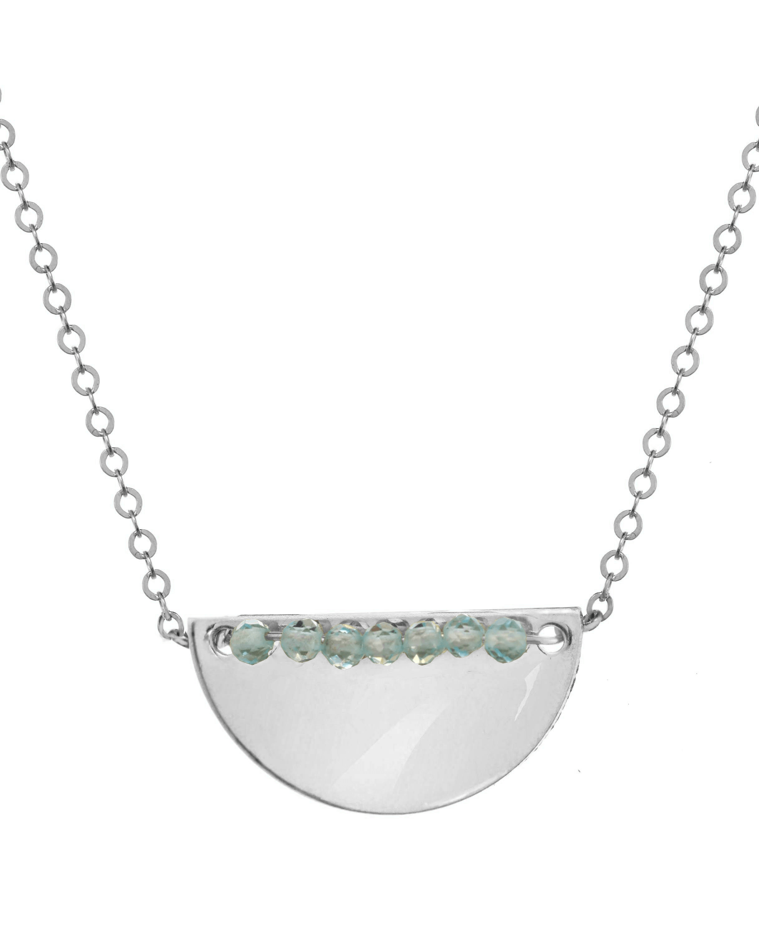 Medina Necklace by KOZAKH. A 16 to 18 inch adjustable length necklace, crafted in Sterling Silver, featuring 2mm faceted gems lined up on a half moon shaped flat metal.