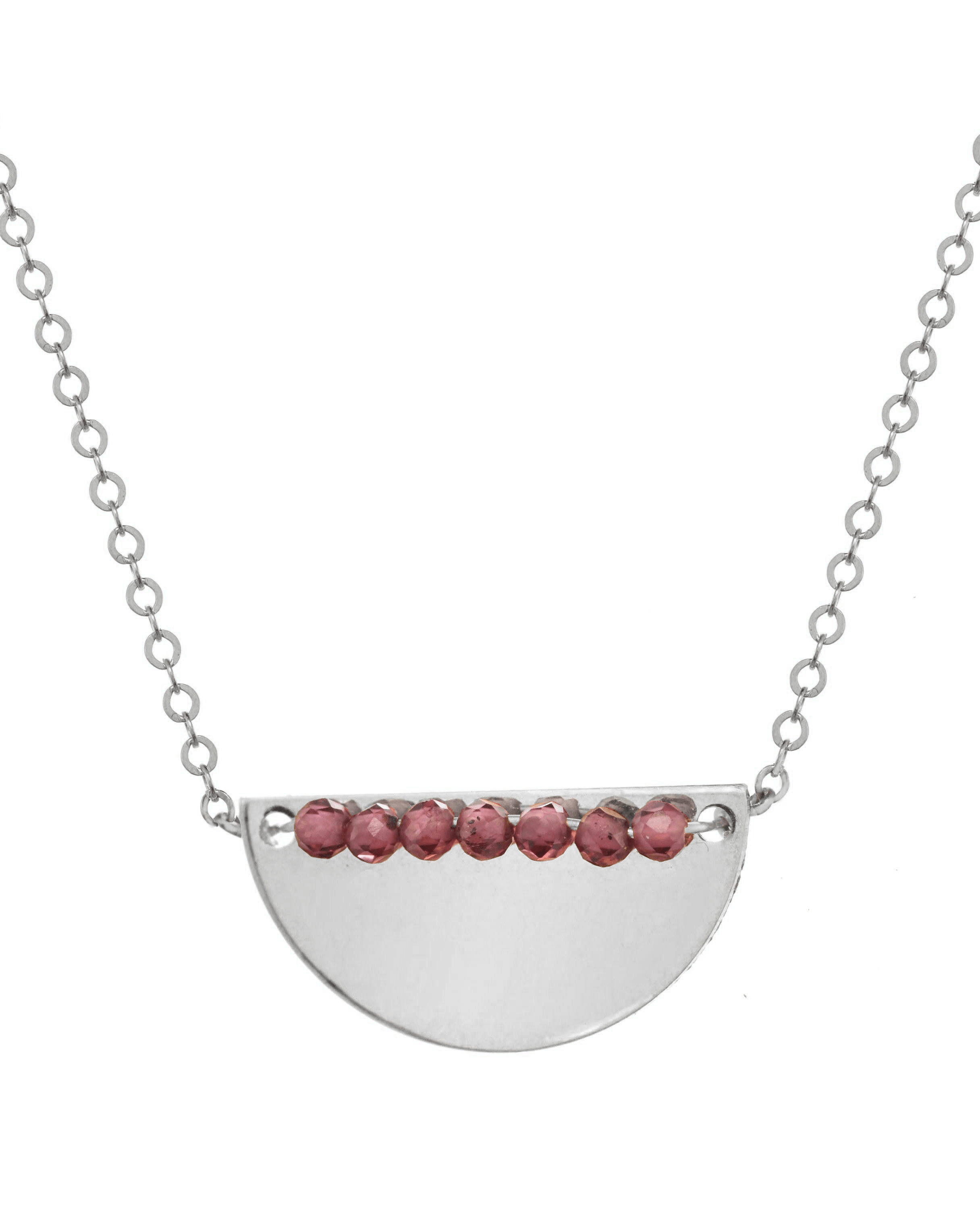 Medina Necklace by KOZAKH. A 16 to 18 inch adjustable length necklace, crafted in Sterling Silver, featuring 2mm faceted gems lined up on a half moon shaped flat metal.