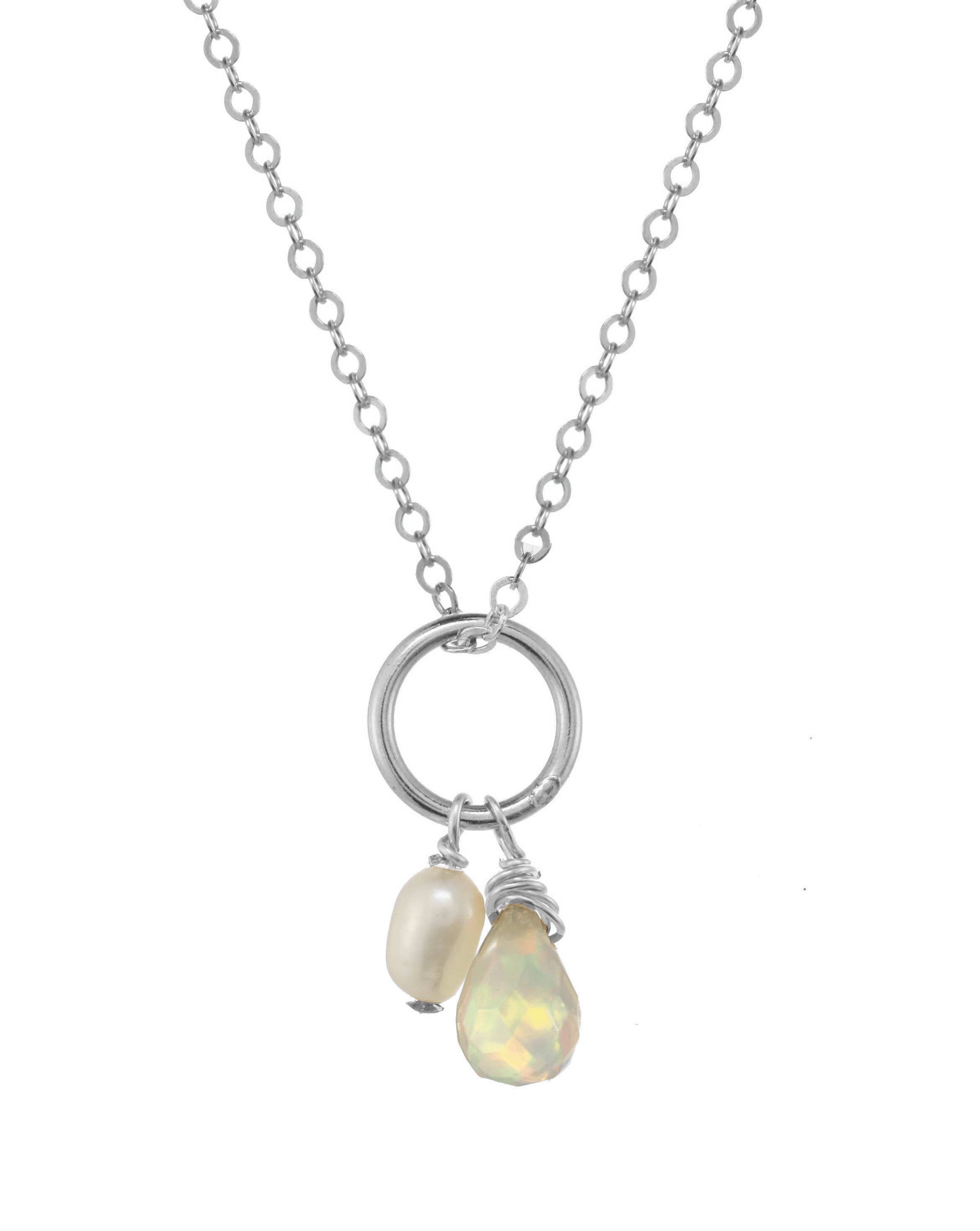 Mika Necklace by KOZAKH. A 16 to 18 inch adjustable length necklace, crafted in Sterling Silver, featuring a 3-4mm white rice Pearl and a 5-6mm faceted Ethiopian Opal droplet.
