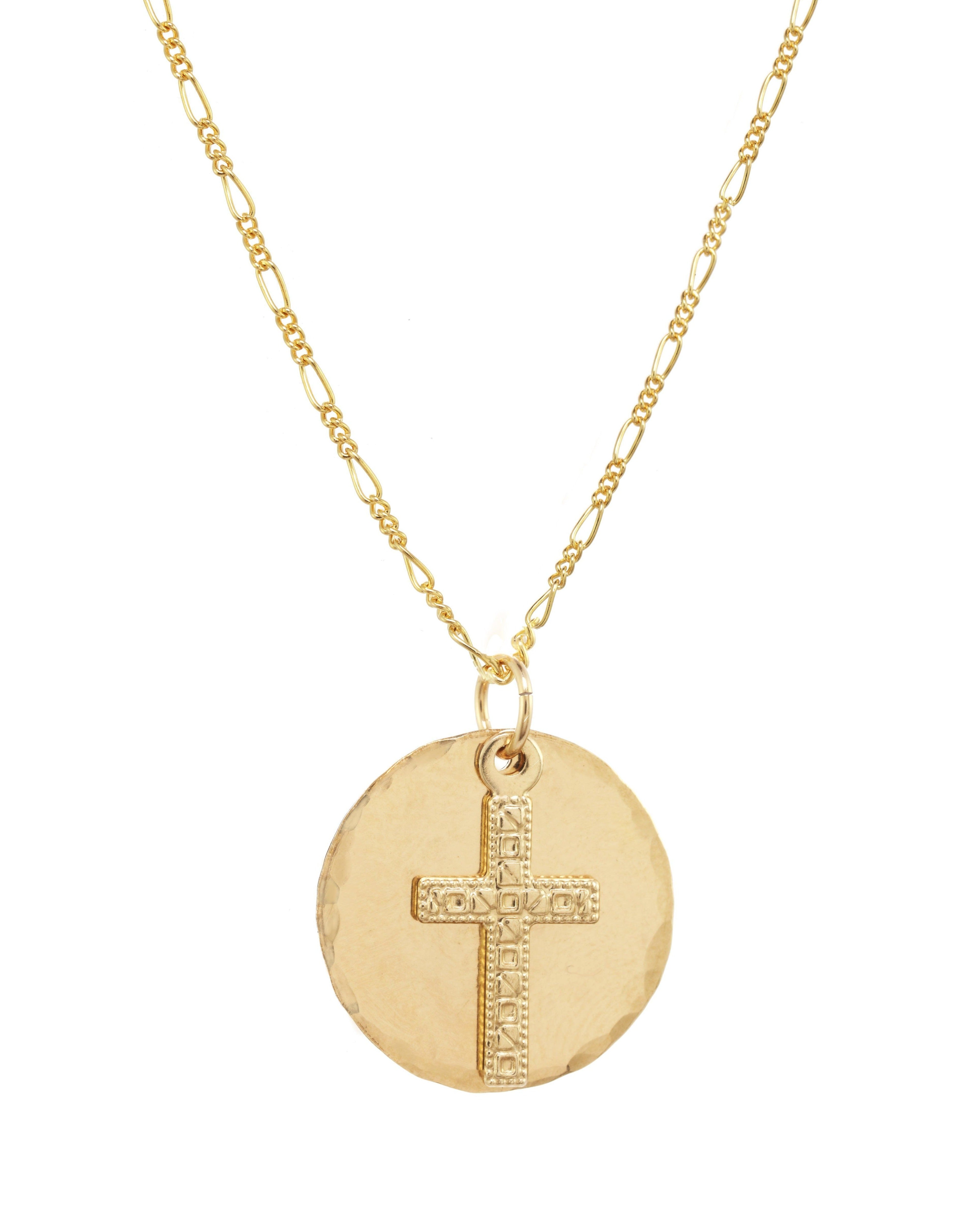 Orbis Necklace by KOZAKH. A 16 to 18 inch adjustable length Figaro chain necklace, crafted in 14K Gold Filled, featuring a 16mm Hammered on the sides coin and a 5x10mm Filigree cross.