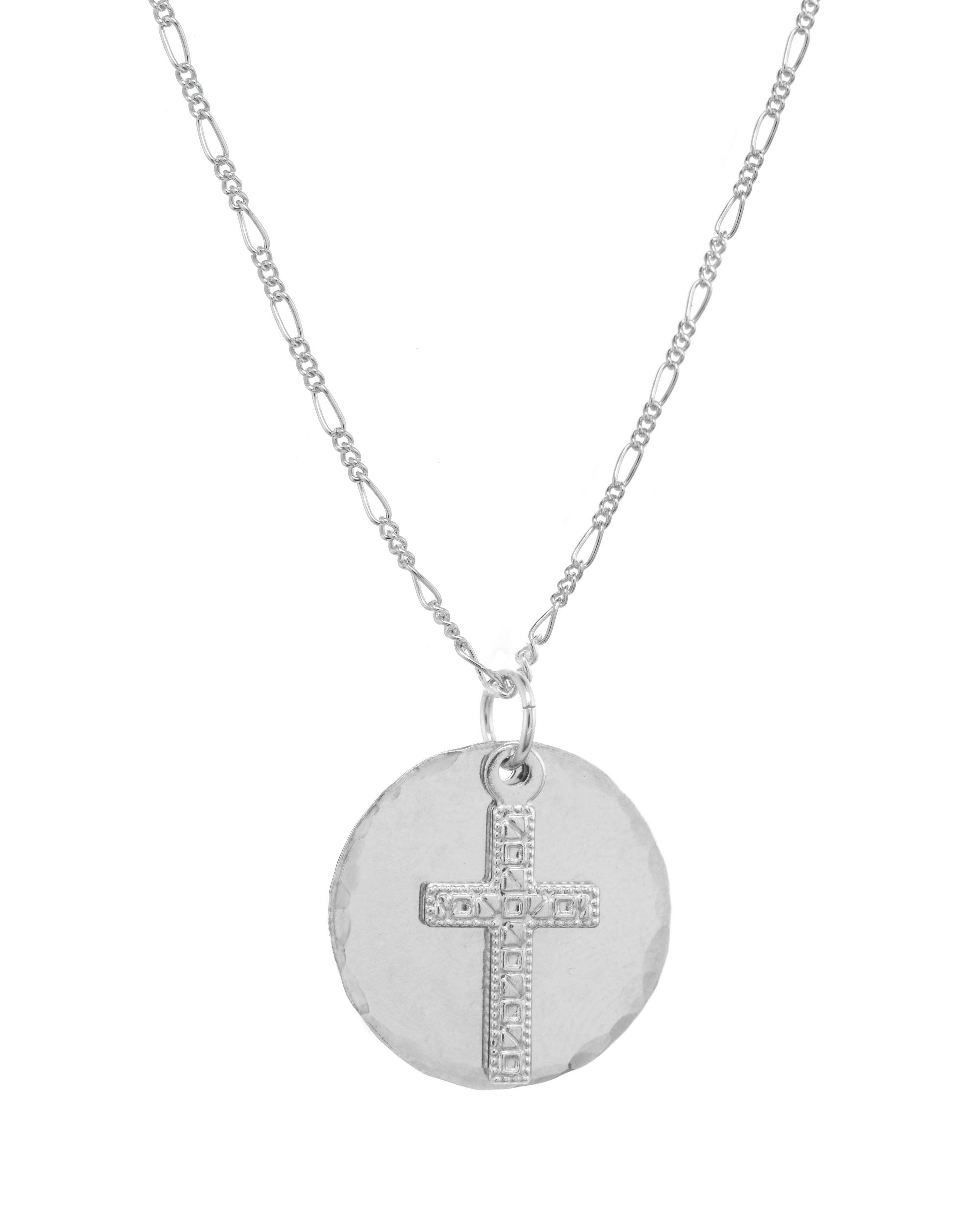 Orbis Necklace by KOZAKH. A 16 to 18 inch adjustable length Figaro chain necklace, crafted in Sterling Silver, featuring a 16mm Hammered on the sides coin and a 5x10mm Filigree cross.