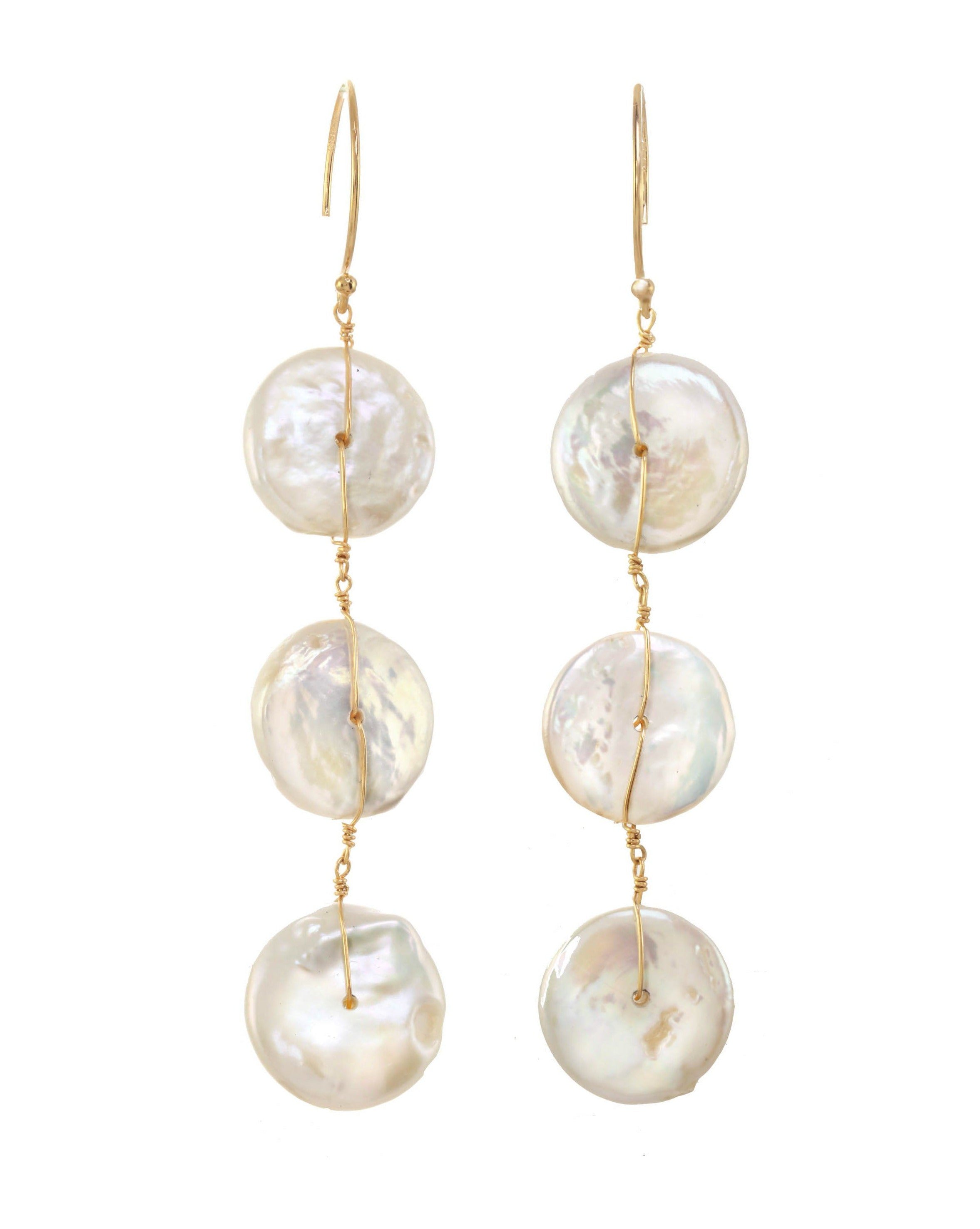 Pamela Earrings by KOZAKH. Round hook earrings crafted in 14K Gold Filled, featuring Keshi white Pearls.