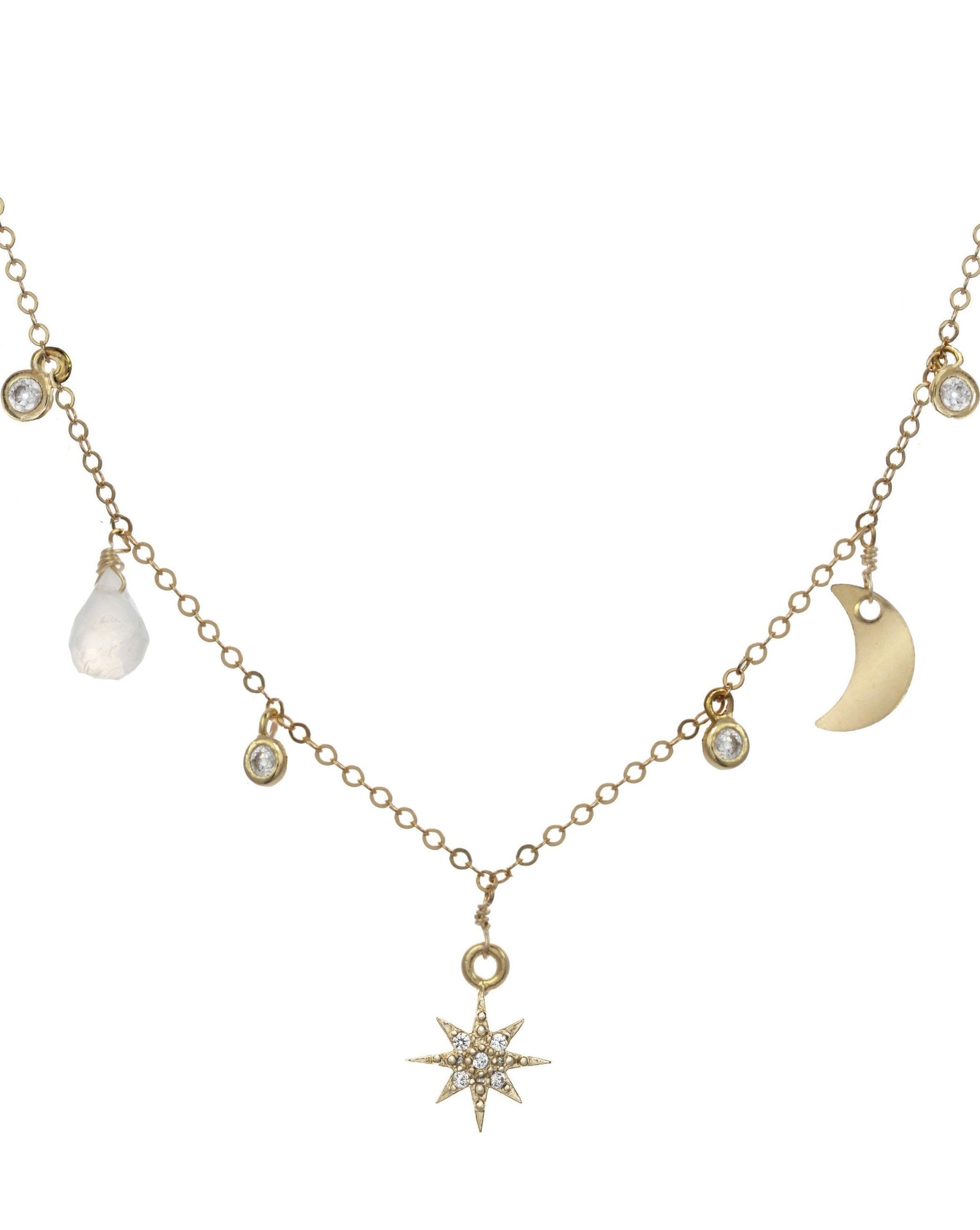 Priya Necklace by KOZAKH. A 16 to 18 inch adjustable length necklace, crafted in 14K Gold Filled, featuring a faceted moonstone droplet, a moon charm, a Cubic Zirconia 8 point star charm, and 2mm CZ bezel charms.