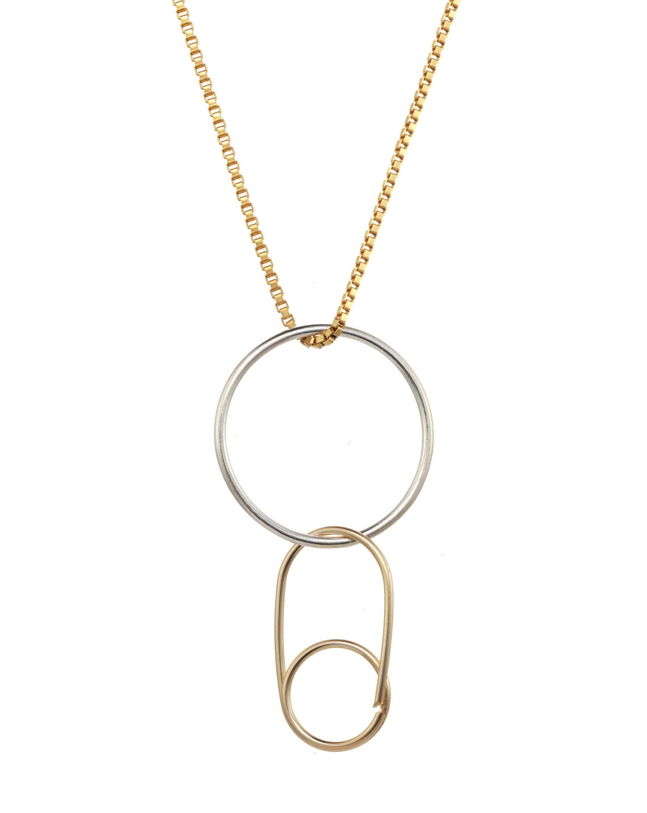 Rina Necklace by KOZAKH. A 16 to 18 inch adjustable length, 1mm box chain necklace, crafted in 14K Gold Filled, featuring a Sterling Silver ring and a hand formed safety pin.