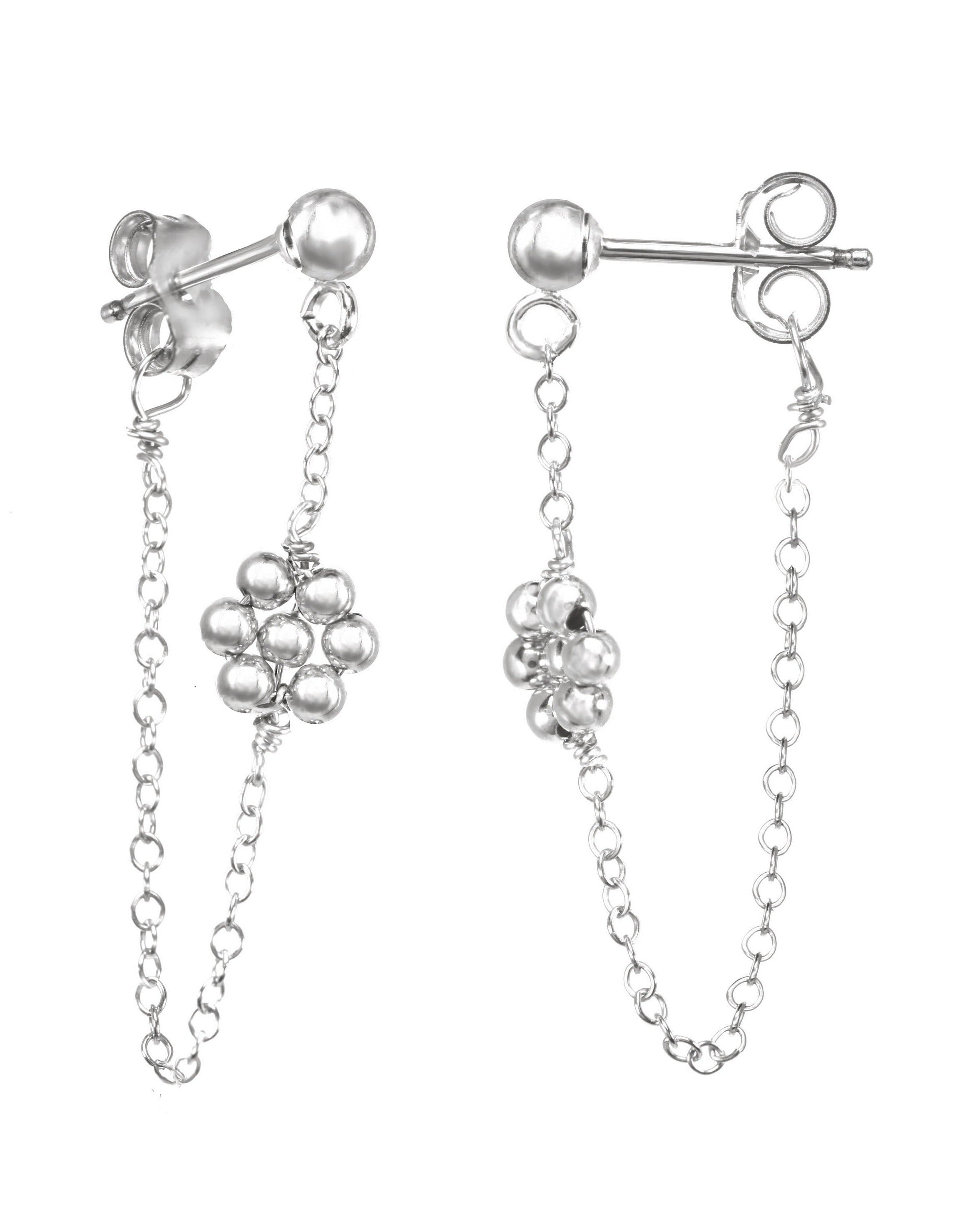 Rosana Earrings by KOZAKH. Front/back style stud closure earrings, crafted in Sterling Silver, featuring dangling handmade beaded daisy charms.