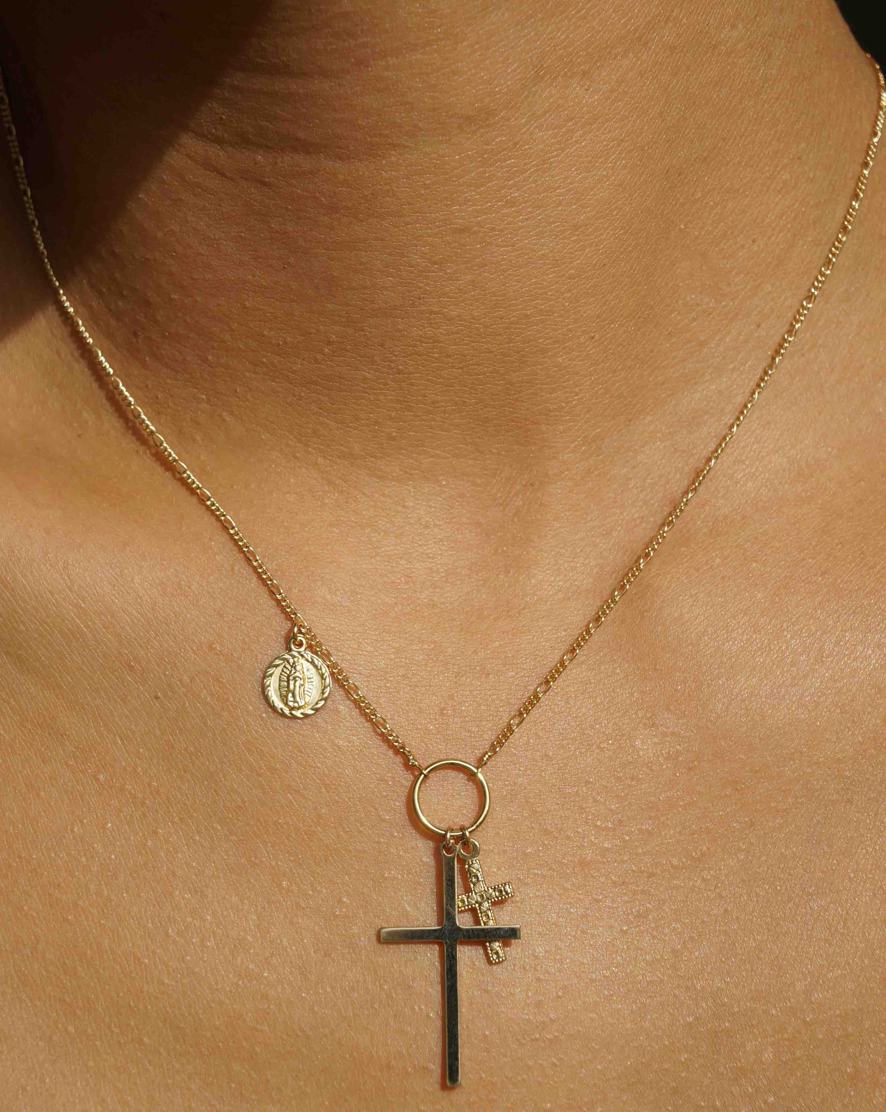 Salvator Necklace by KOZAKH. A 16 to 18 inch adjustable length necklace, crafted in 14K Gold Filled, featuring a Virgin Mary side coin, a 17x30mm flat plan cross, and a 5x10mm Filigree cross.