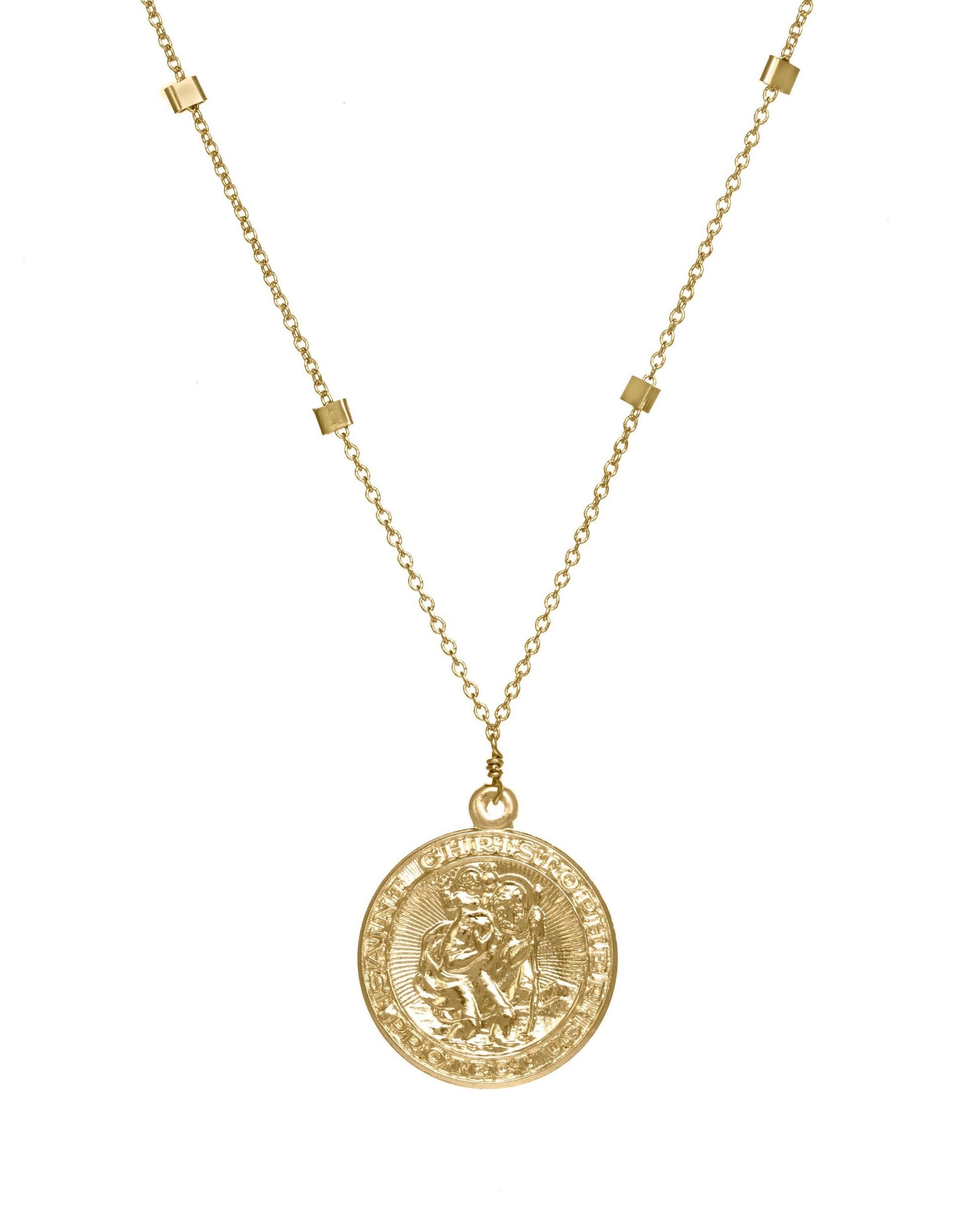 San Cris Necklace by KOZAKH. A 16 to 18 inch adjustable length necklace, crafted in 14K Gold Filled, featuring a 16mm Saint Christopher Medallion.