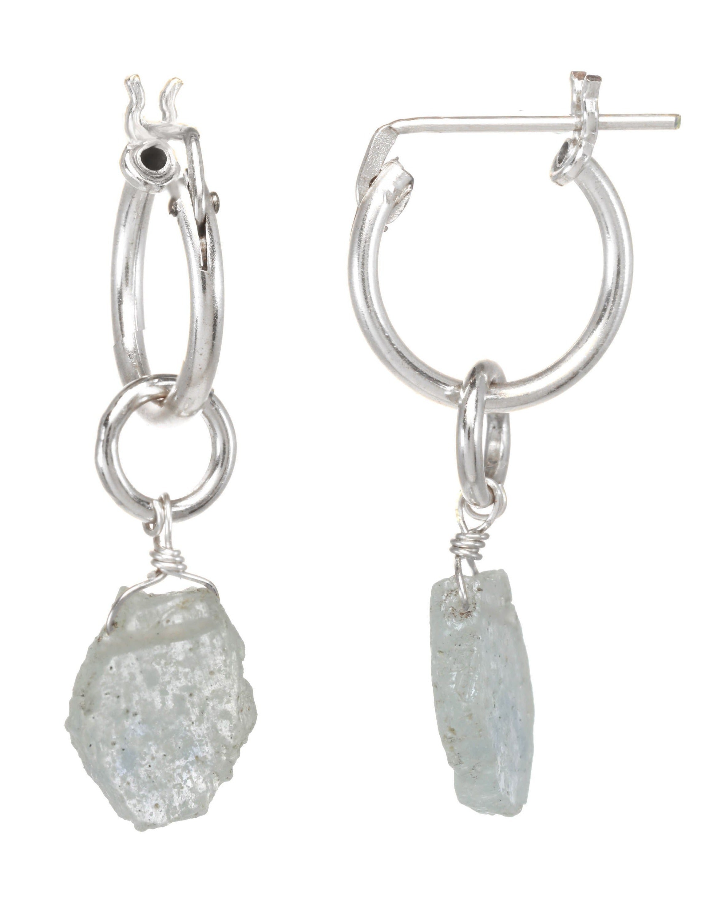 Sugar Earrings by KOZAKH. 12mm snap closure hoop earrings, with 1 inch drop length, crafted in Sterling Silver, featuring a Blue Tourmaline slice.