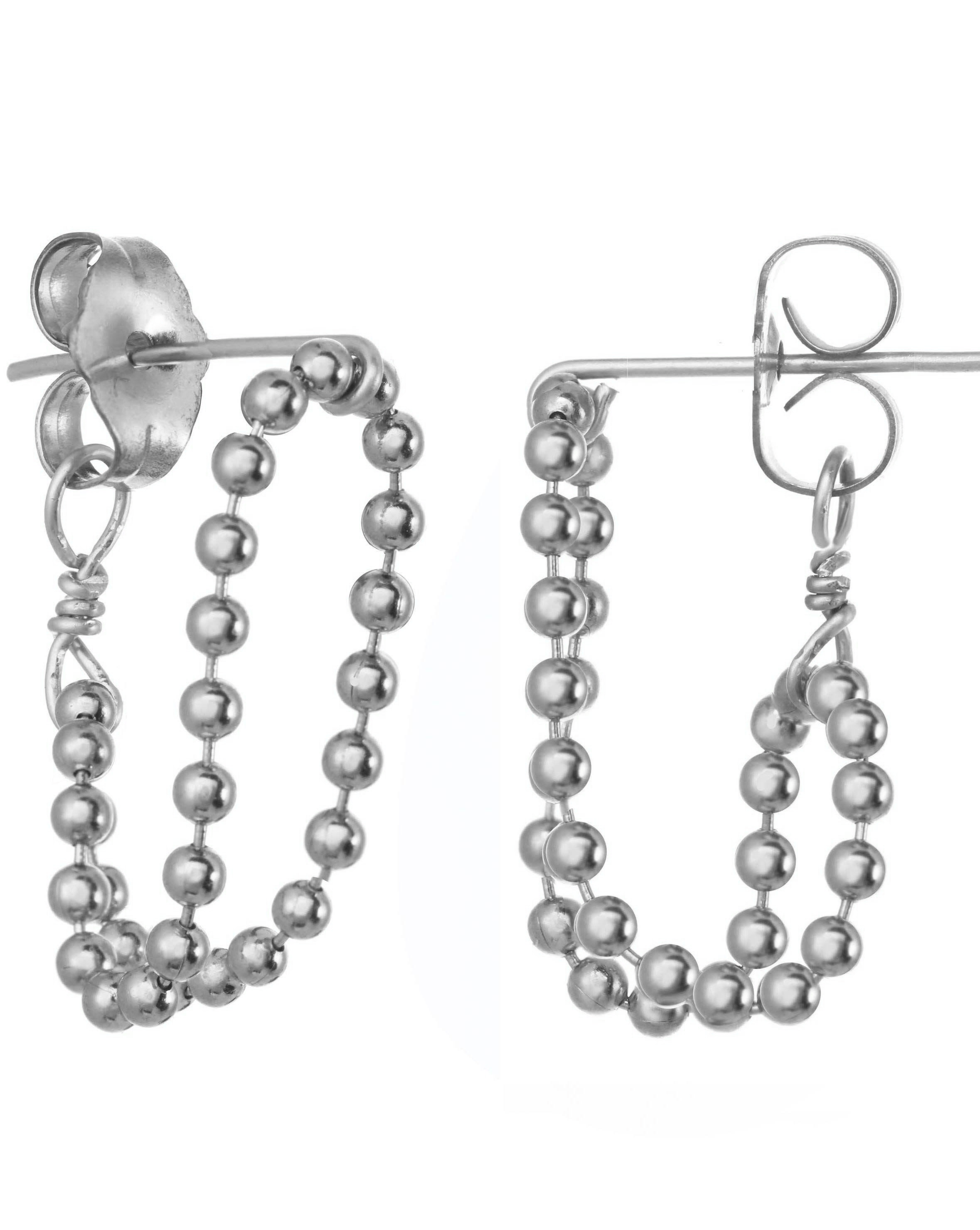 Venla Huggie Earrings by KOZAKH. Stud earrings, crafted in Sterling Silver, featuring a strand of 1mm seamless beads.