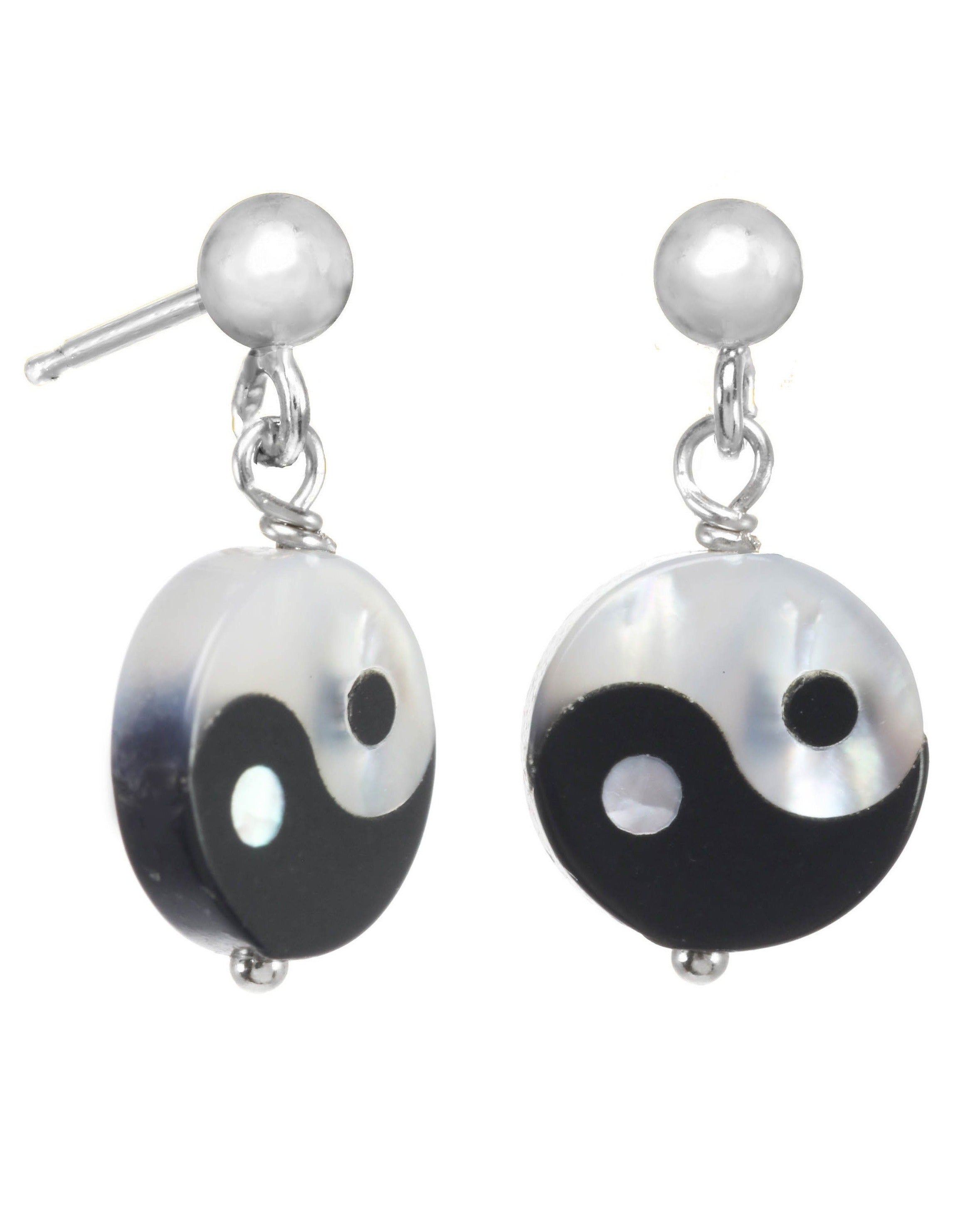 Yin Yang Earrings by KOZAKH. 3mm Ball stud earrings with 0.5 inch drop length, crafted in Sterling Silver, featuring a hand carved Mother of Pearl Yin Yang charm.