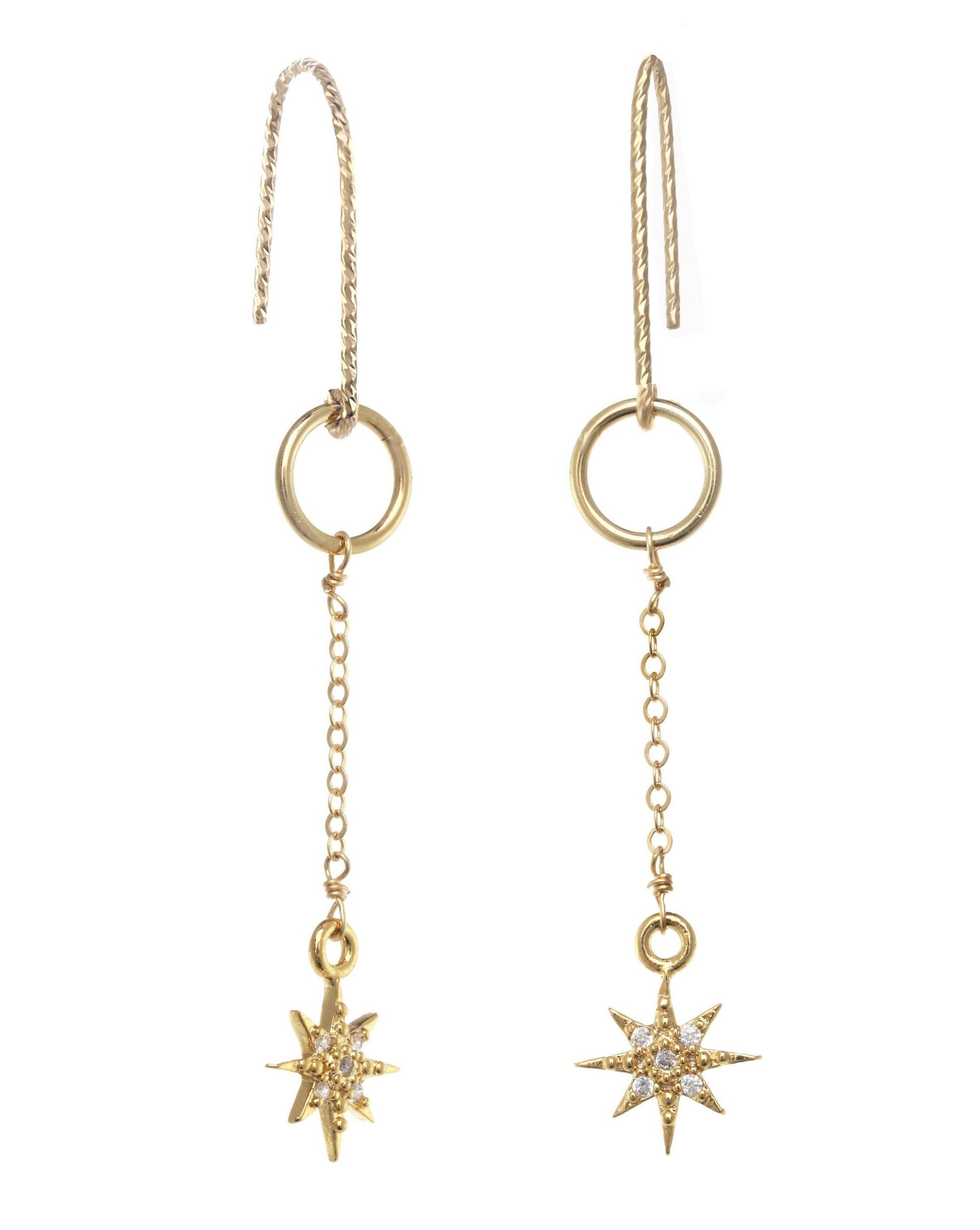 You Stardrop Earrings by KOZAKH. Diamond textured hook dangling earrings, crafted in 14K Gold Filled, featuring a Cubic Zirconia encrusted 8 point star charm.