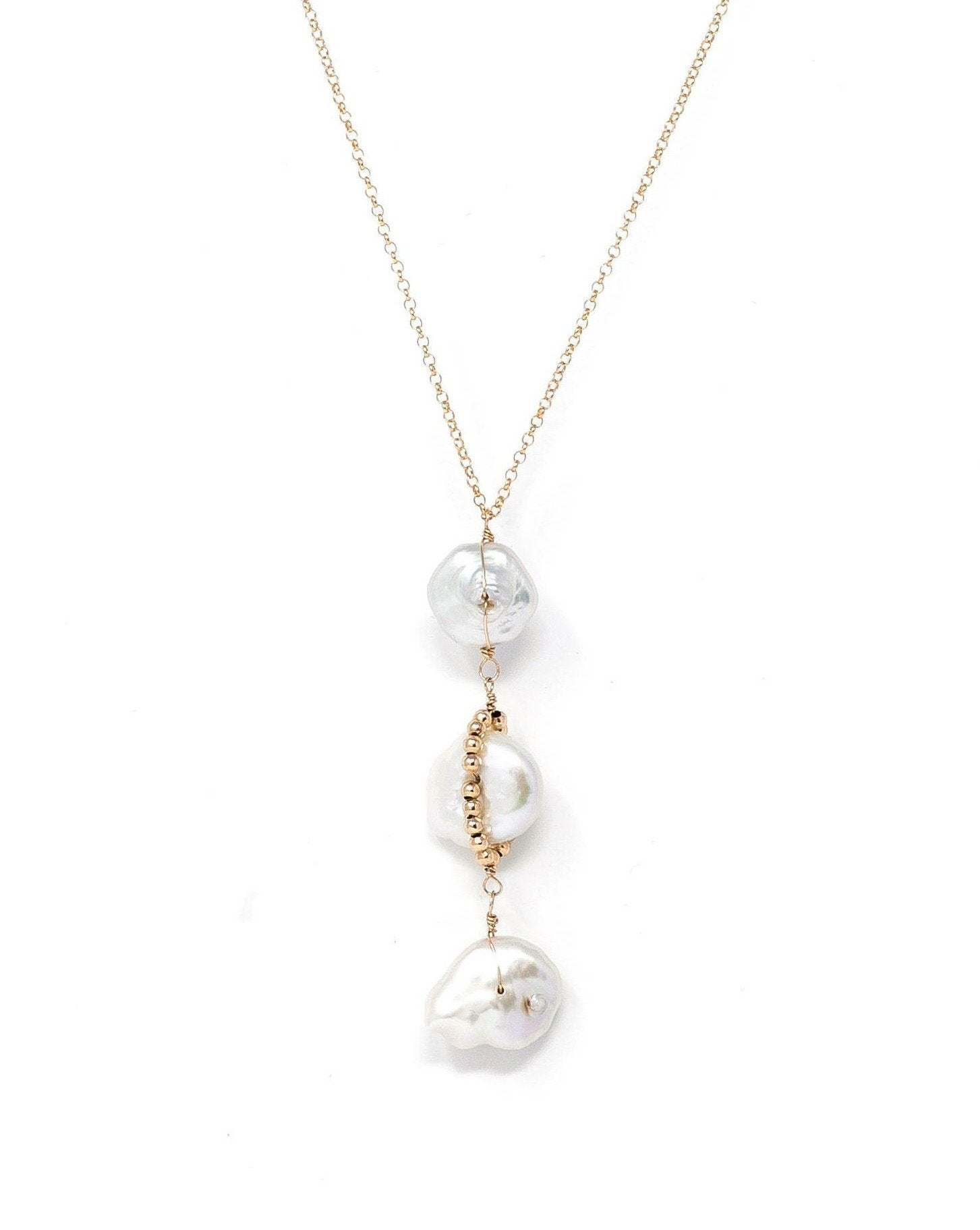 Zaya Necklace by KOZAKH. A 16 to 25 inch adjustable length necklace, crafted in 14K Gold Filled, featuring White Keshi Pearls and 2mm Seamless beads.